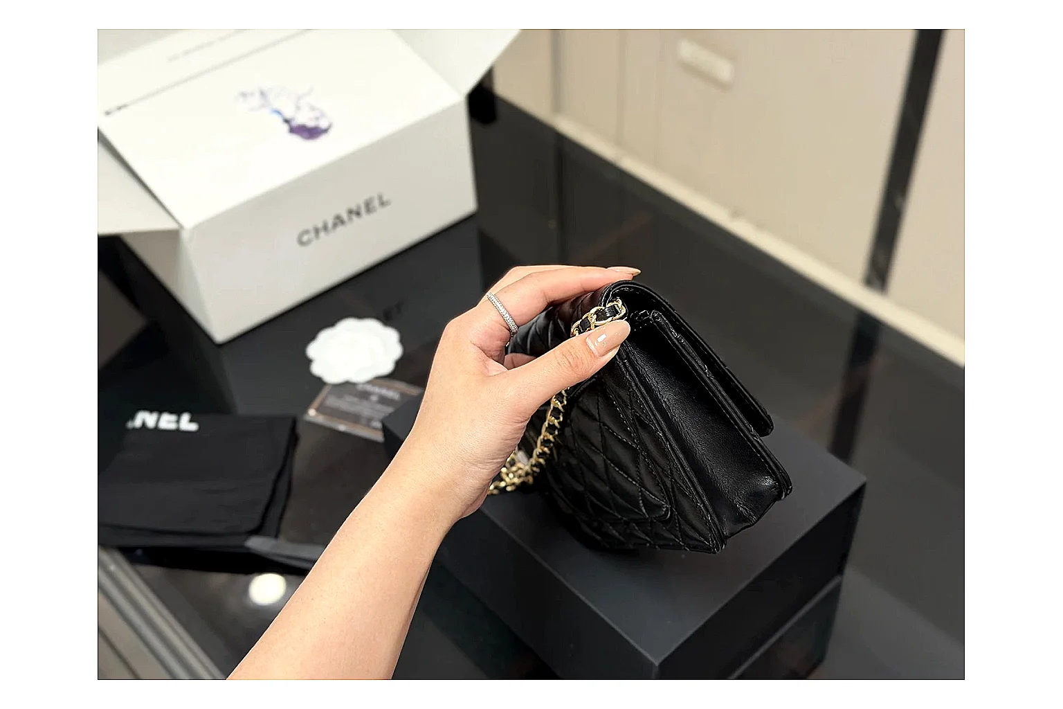 Chanel Quilted Wallet Bag Black Floral spreadsheet record photo showing black quilted wallet-bag body, floral detail, compact flap shape, and polished chain hardware thumbnail 3