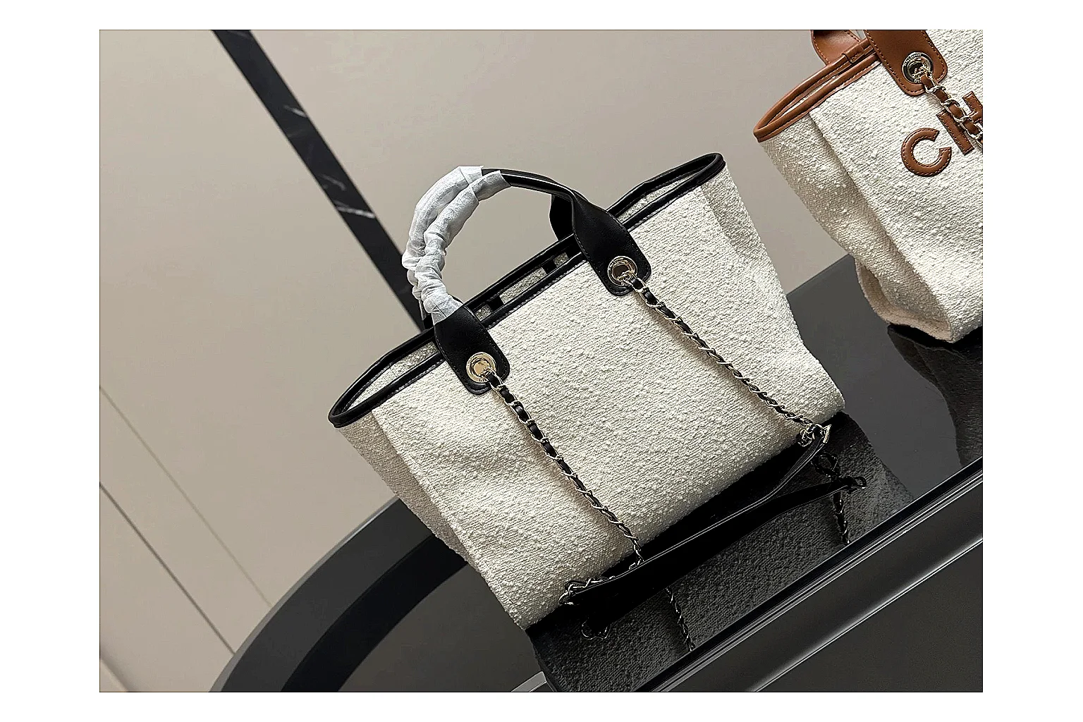 Chanel Tote Bag White Black spreadsheet record photo showing white black canvas-leather tote body, open carry shape, structured handles, and branded luxury-bag details thumbnail 5