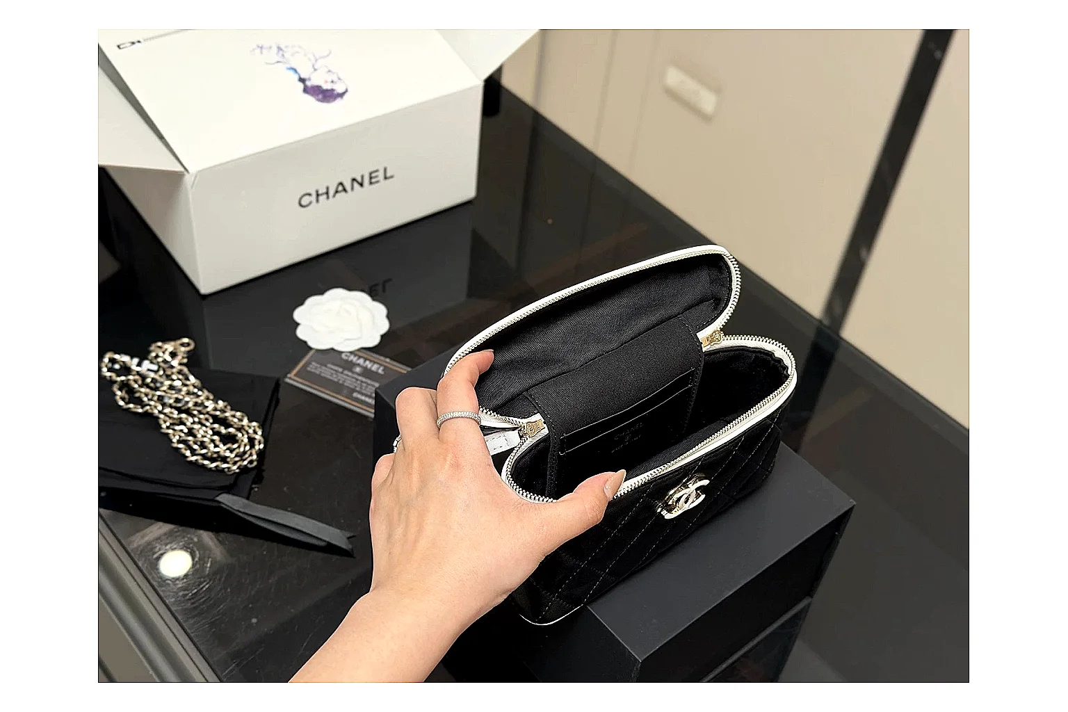 Chanel Wallet On Chain Black spreadsheet record photo showing black quilted leather wallet body, chain strap, flap closure, and compact shoulder-bag profile thumbnail 4