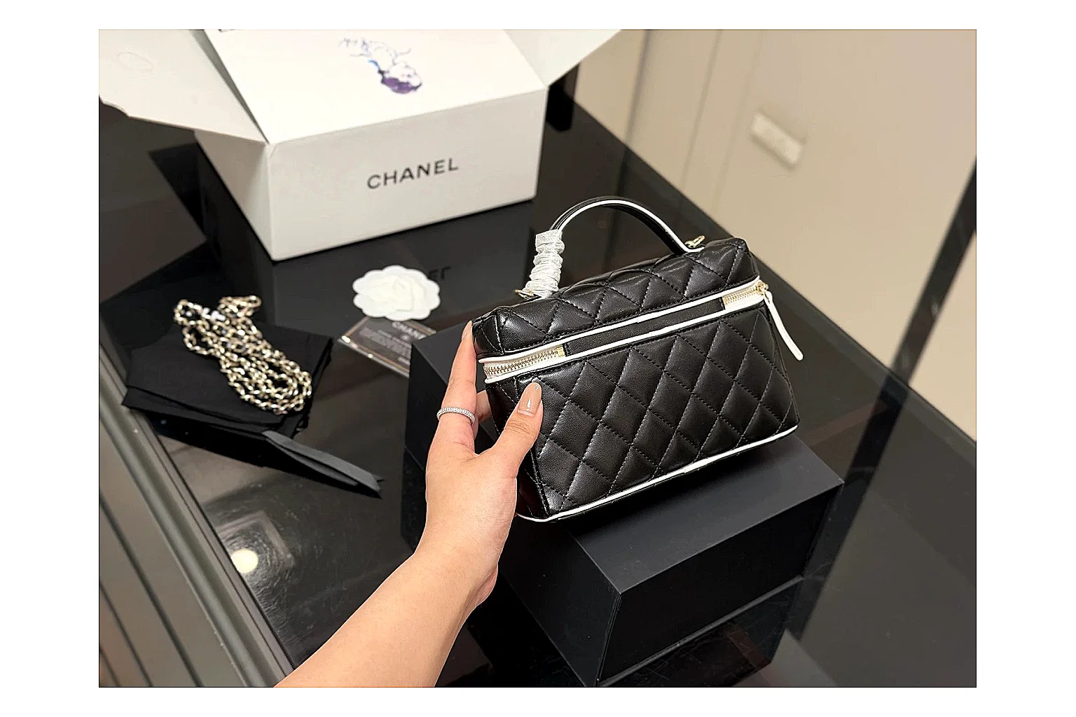 Chanel Wallet On Chain Black spreadsheet record photo showing black quilted leather wallet body, chain strap, flap closure, and compact shoulder-bag profile thumbnail 5