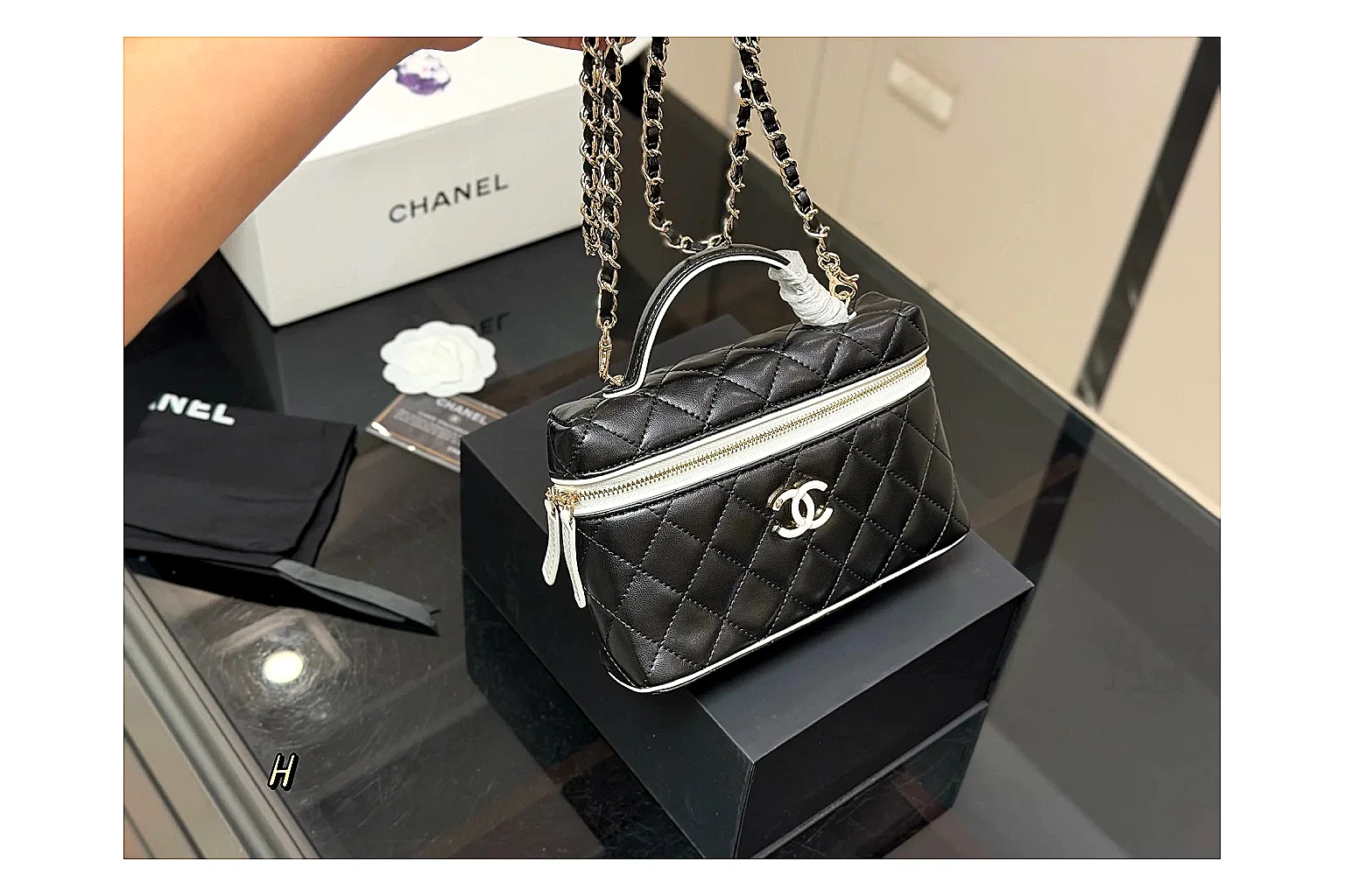 Chanel Wallet On Chain Black spreadsheet record photo showing black quilted leather wallet body, chain strap, flap closure, and compact shoulder-bag profile thumbnail 6