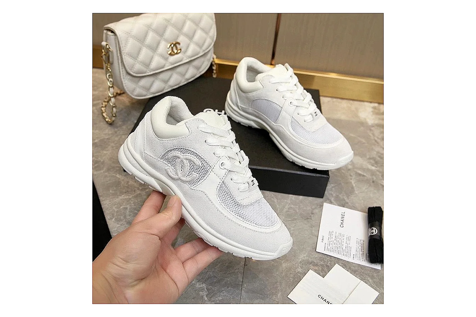 Kako Sheetbase record image for Chanel White Runner Sneaker