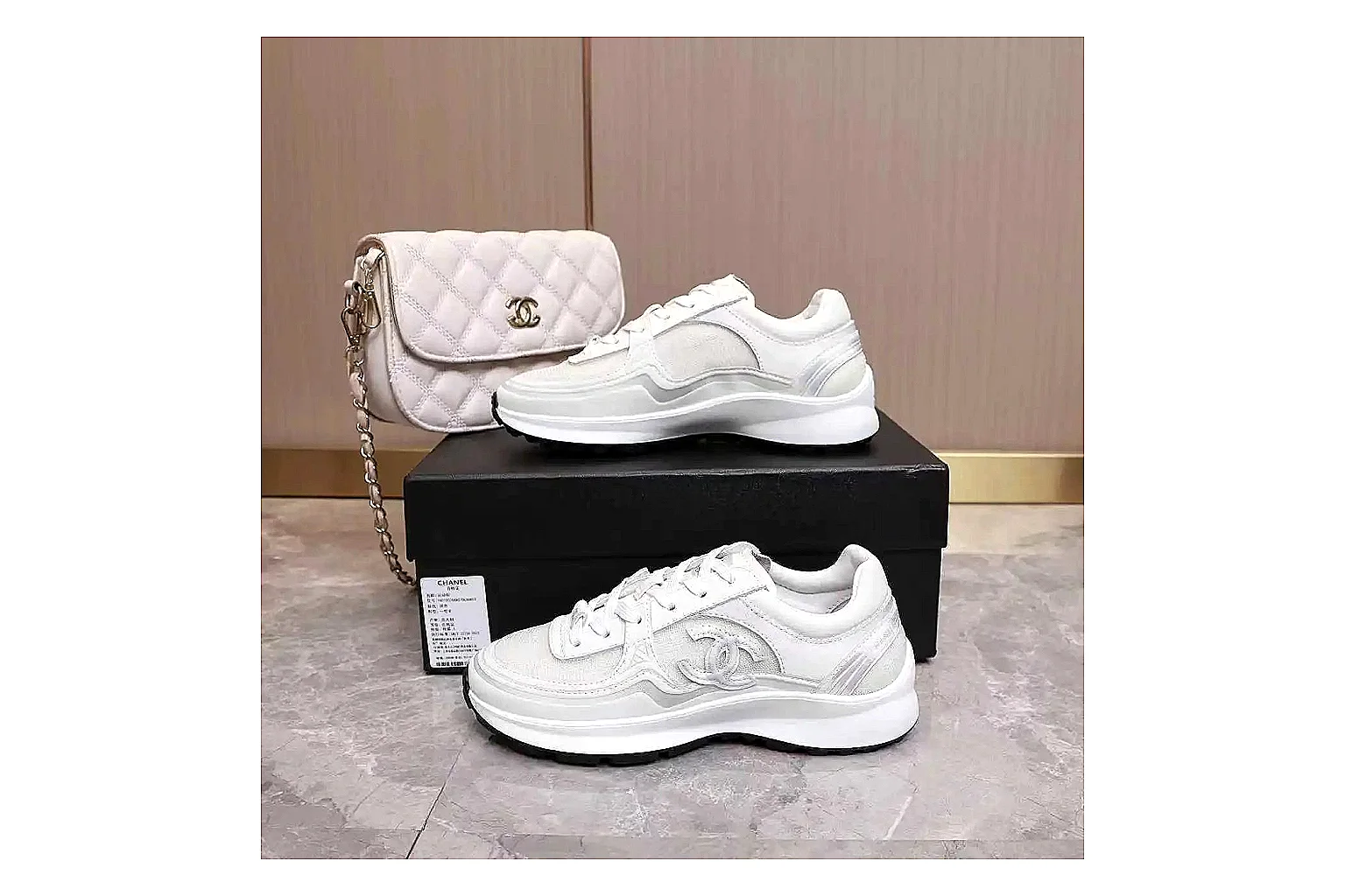 Kako Sheetbase record image for Chanel White Runner Sneaker