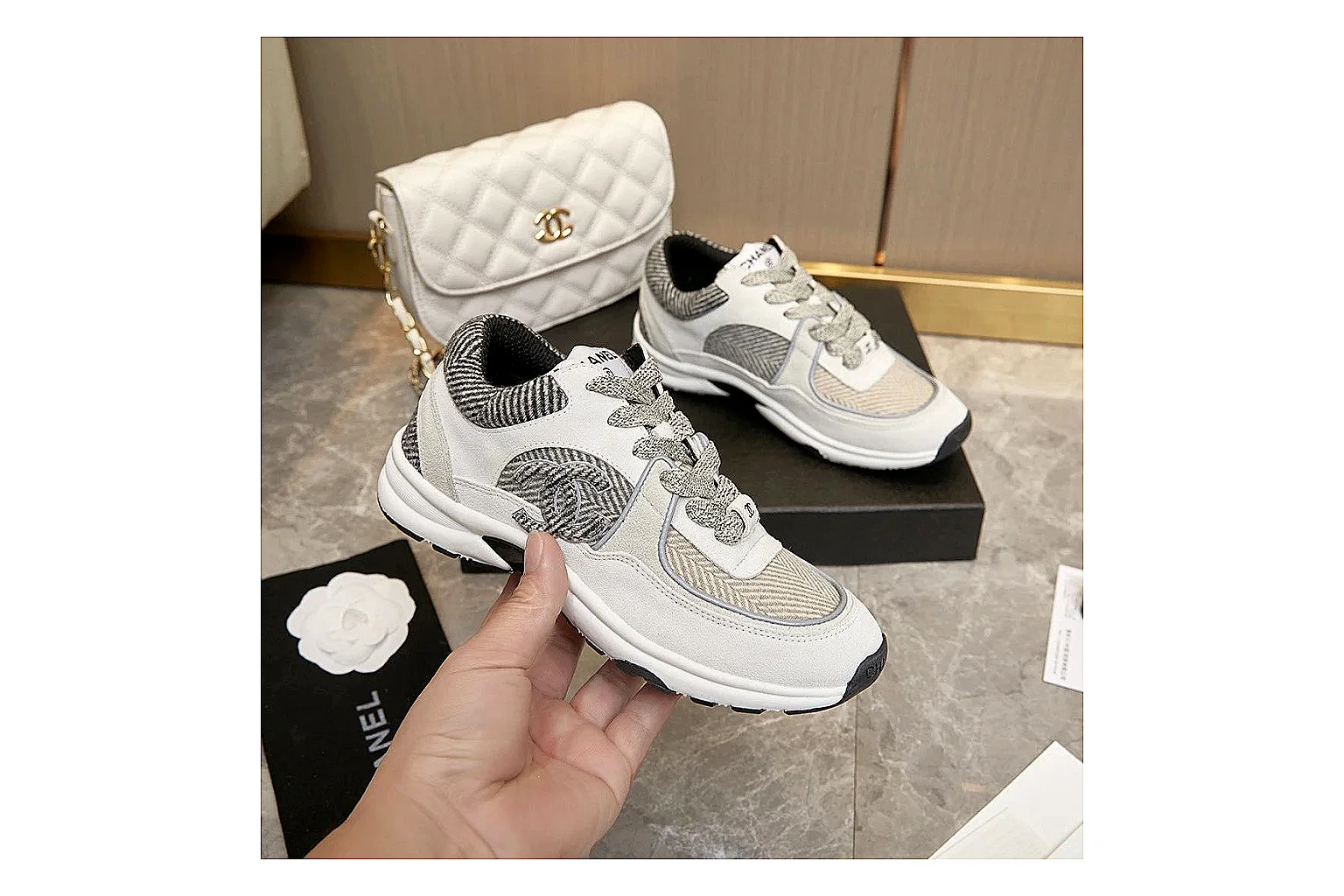 Kako Sheetbase record image for Chanel White Runner Sneaker