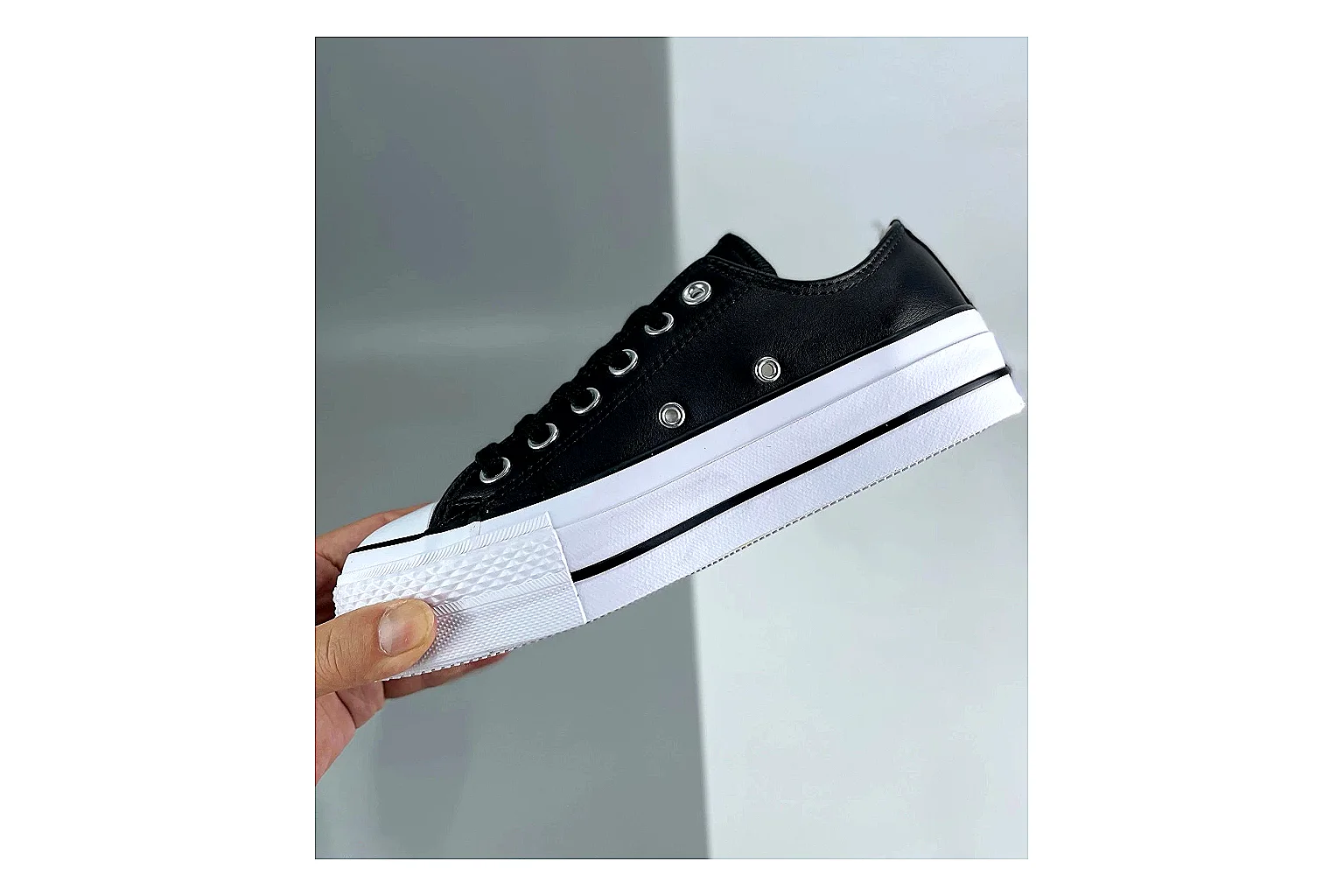 Converse All Star Lift Black Platform Low Top spreadsheet record photo showing black leather low-top upper, silver eyelets, white rubber toe cap, and elevated striped platform sole thumbnail 3