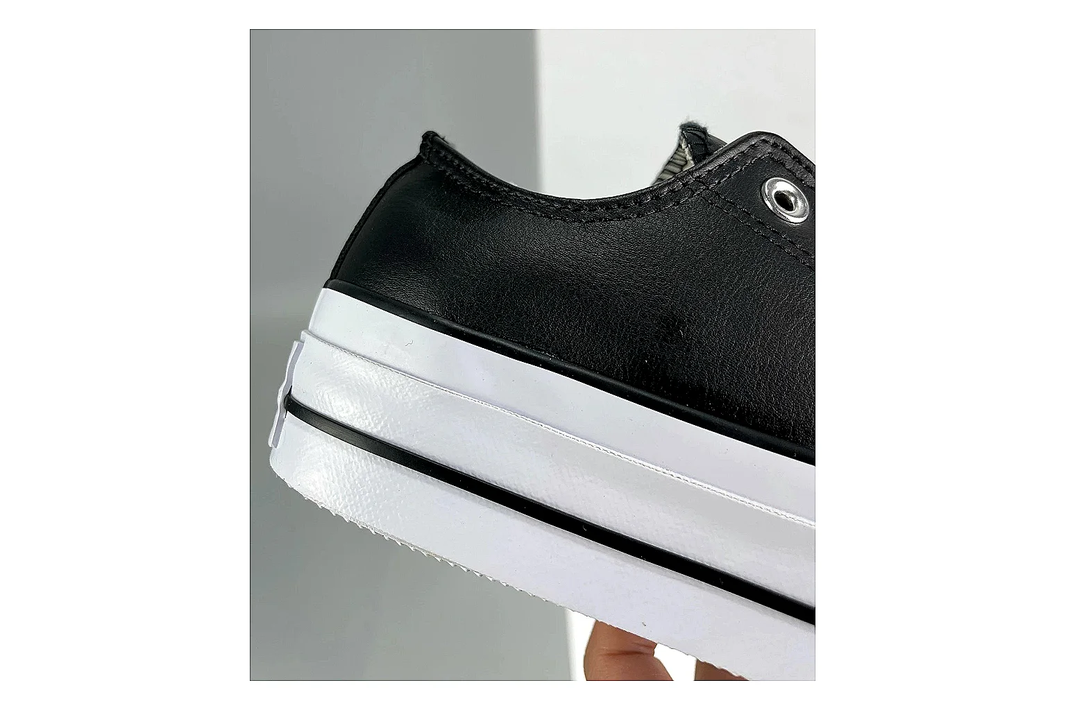 Converse All Star Lift Black Platform Low Top spreadsheet record photo showing black leather low-top upper, silver eyelets, white rubber toe cap, and elevated striped platform sole thumbnail 5