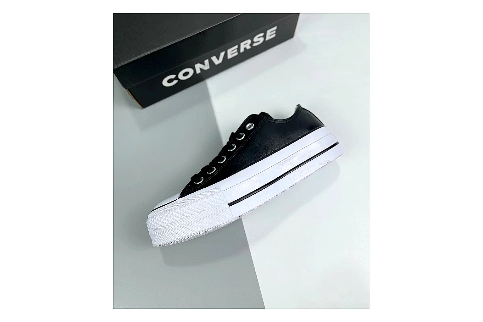 Converse All Star Lift Black Platform Low Top spreadsheet record photo showing black leather low-top upper, silver eyelets, white rubber toe cap, and elevated striped platform sole thumbnail 6
