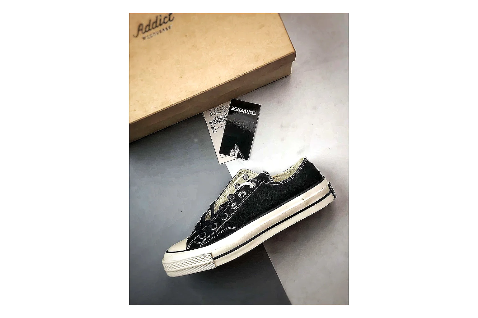 Converse Chuck Low Black White spreadsheet record photo showing black canvas low-top upper, white rubber toe cap, metal eyelets, and classic Converse sole thumbnail 2