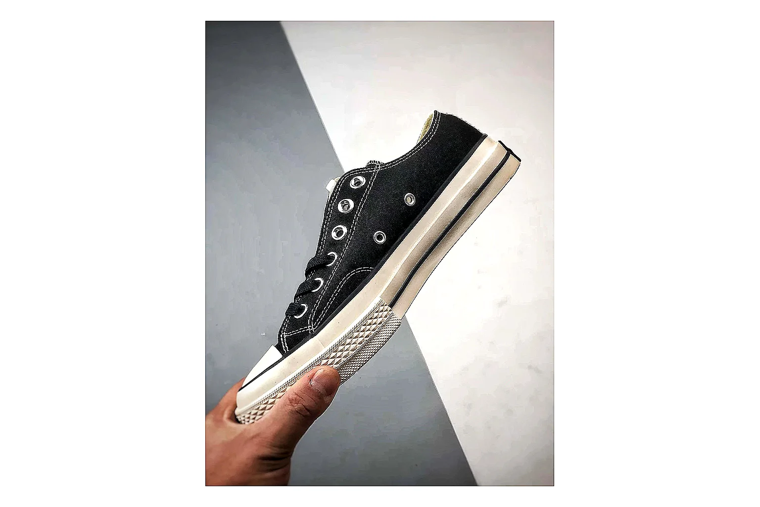 Converse Chuck Low Black White spreadsheet record photo showing black canvas low-top upper, white rubber toe cap, metal eyelets, and classic Converse sole thumbnail 3