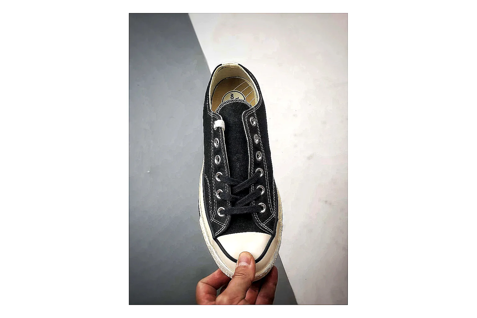 Converse Chuck Low Black White spreadsheet record photo showing black canvas low-top upper, white rubber toe cap, metal eyelets, and classic Converse sole thumbnail 6