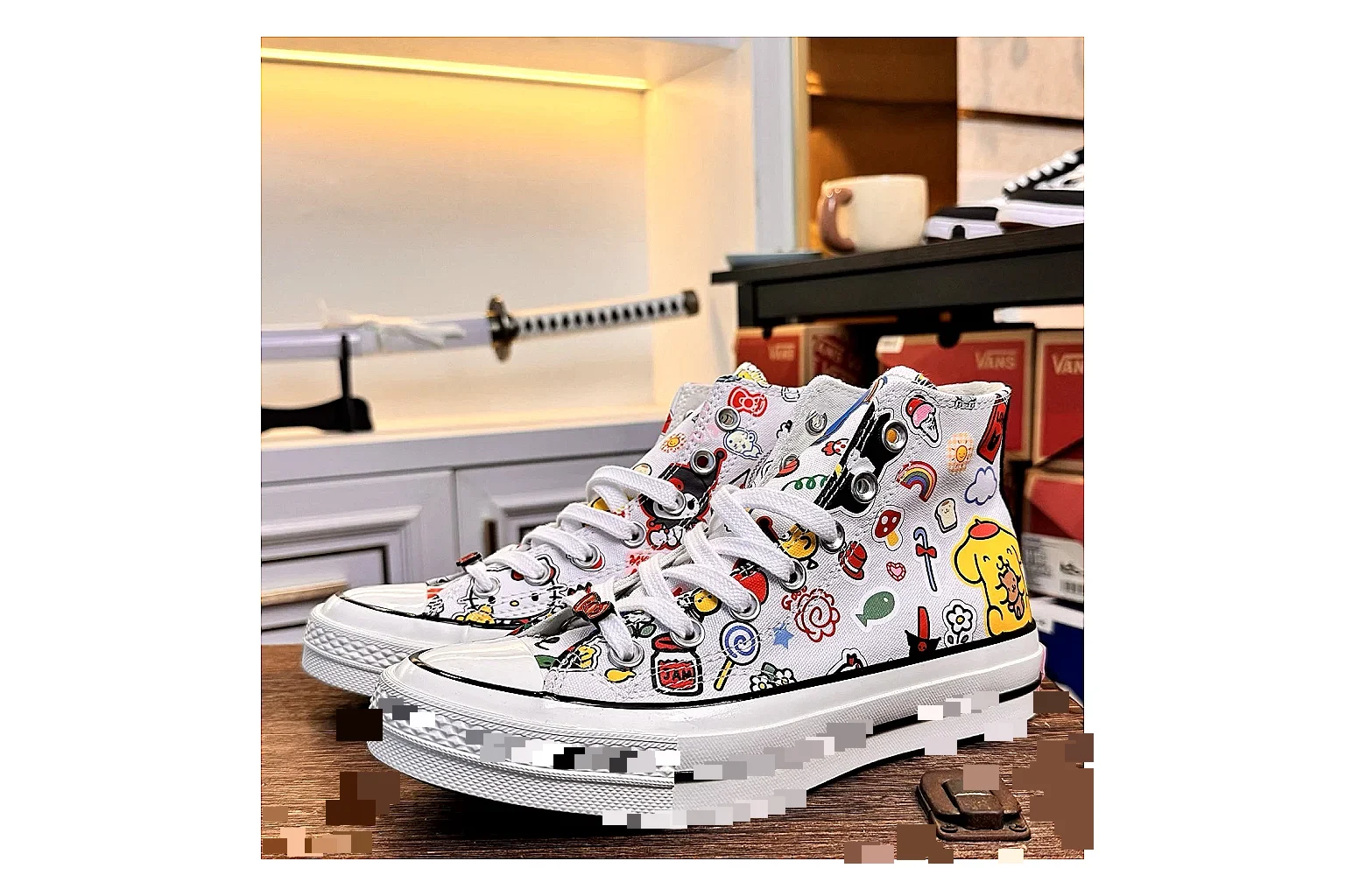 Converse Hello Kitty Chuck 70 High Top spreadsheet record photo showing white canvas high-top upper, colorful character graphics, metal eyelets, rubber toe cap, and elevated vintage sole