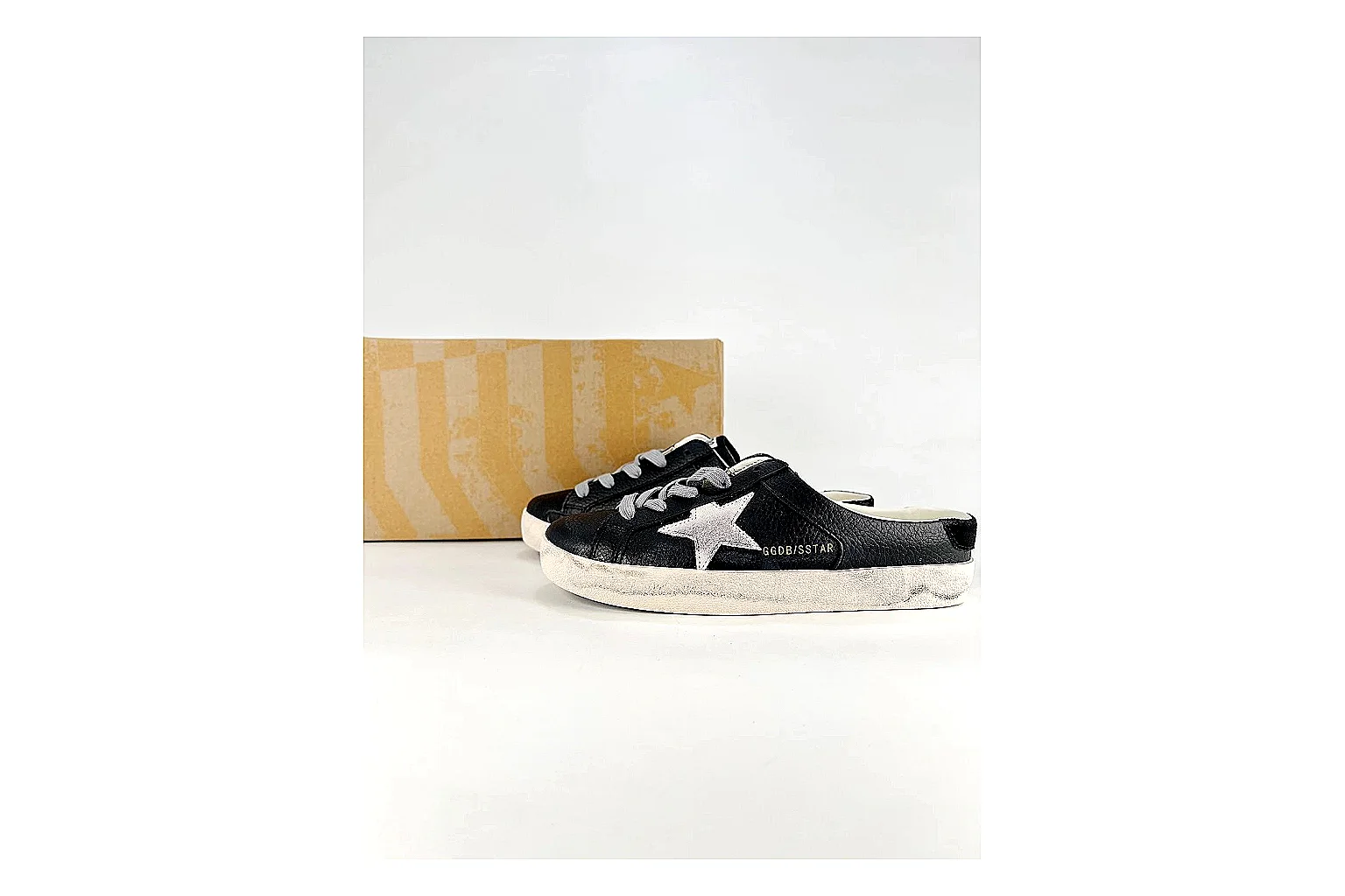 GGDB Super-Star Black White Sneakers spreadsheet record image with black white distressed low-top sneakers with leather texture, side-profile shape, upper panel lines, and outsole detail
