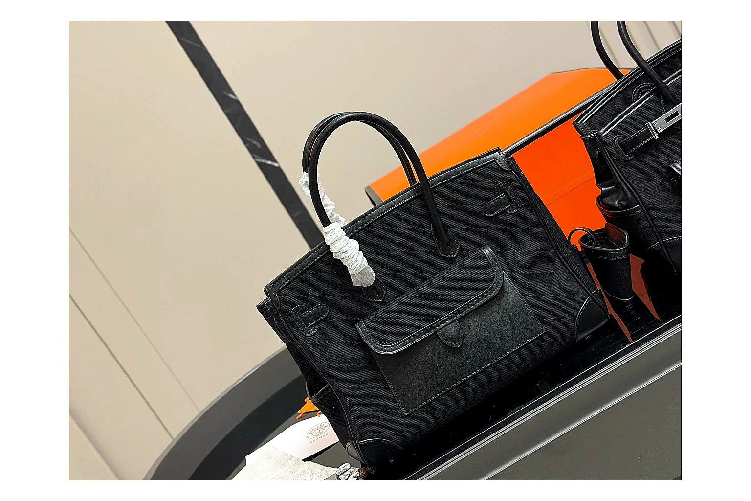 Hermes Birkin Style Black spreadsheet record photo showing black leather structured body, top handles, flap-and-strap shape, and polished hardware thumbnail 5