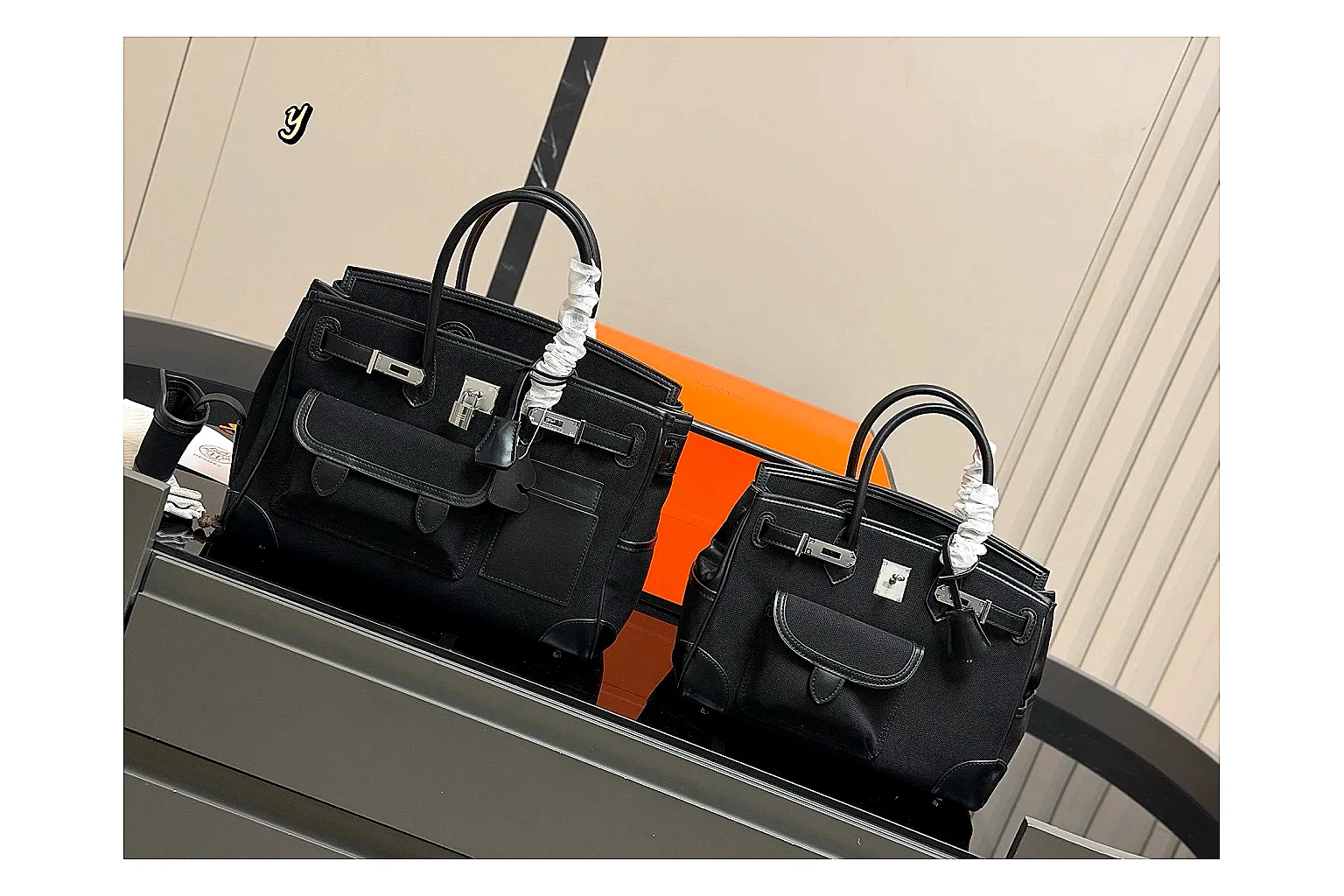 Hermes Birkin Style Black spreadsheet record photo showing black leather structured body, top handles, flap-and-strap shape, and polished hardware thumbnail 6
