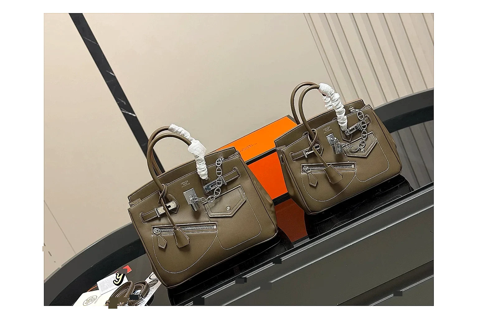 Hermes Birkin Style Olive spreadsheet record photo showing olive leather structured body, top handles, flap-and-strap shape, and polished hardware