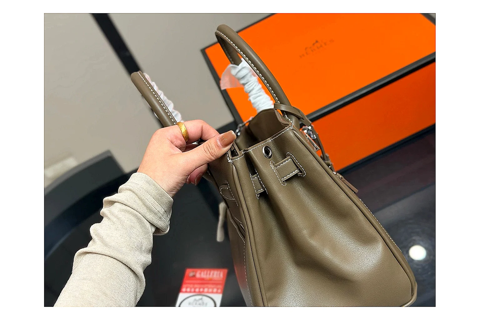 Hermes Birkin Style Olive spreadsheet record photo showing olive leather structured body, top handles, flap-and-strap shape, and polished hardware thumbnail 3
