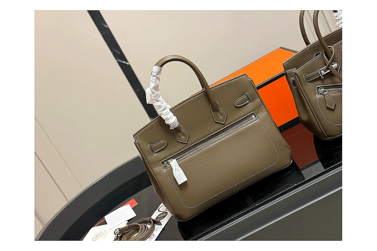 Hermes Birkin Style Olive spreadsheet record photo showing olive leather structured body, top handles, flap-and-strap shape, and polished hardware thumbnail 5