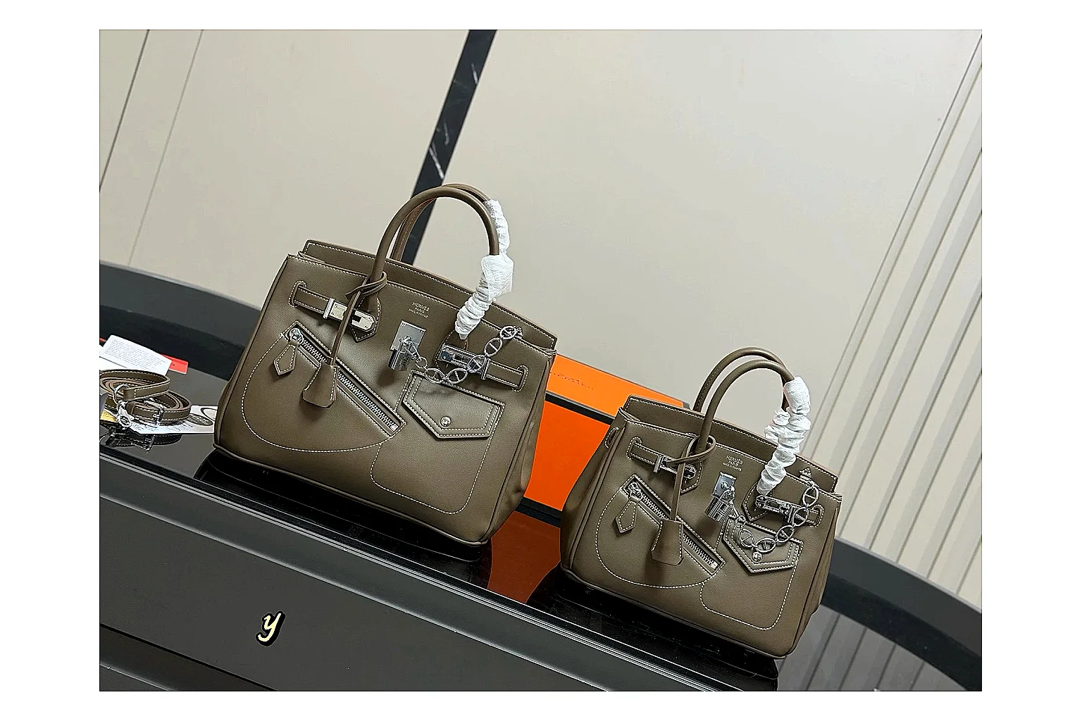 Hermes Birkin Style Olive spreadsheet record photo showing olive leather structured body, top handles, flap-and-strap shape, and polished hardware thumbnail 6