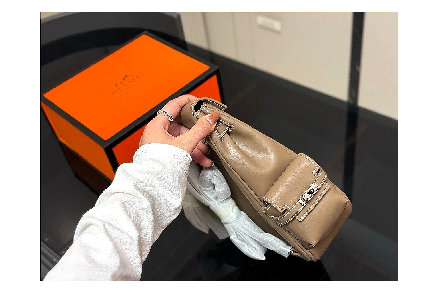 Hermes Kelly Backpack Beige spreadsheet record photo showing beige leather backpack body, Kelly-style flap, top handle, shoulder straps, and polished hardware thumbnail 5
