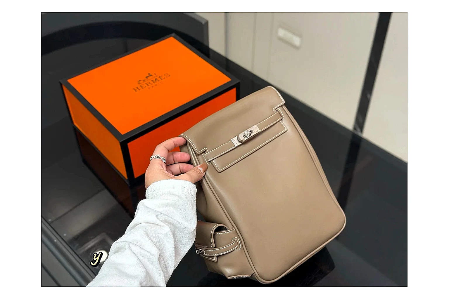 Hermes Kelly Backpack Beige spreadsheet record photo showing beige leather backpack body, Kelly-style flap, top handle, shoulder straps, and polished hardware thumbnail 6