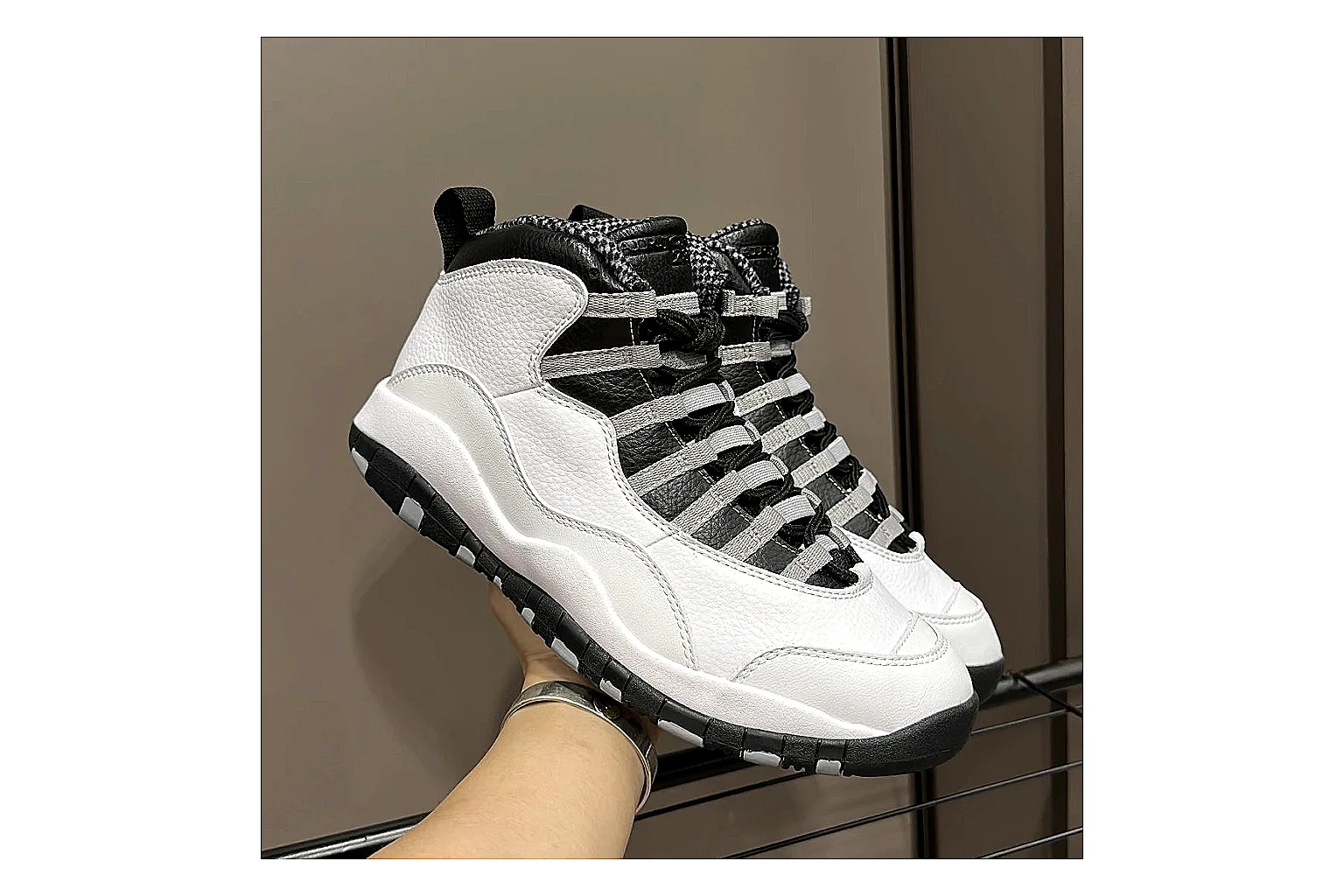 Jordan Air Jordan 10 Steel White Black spreadsheet record photo showing white and black high-top court upper, striped lace panels, Jumpman heel branding, and retro sole thumbnail 2