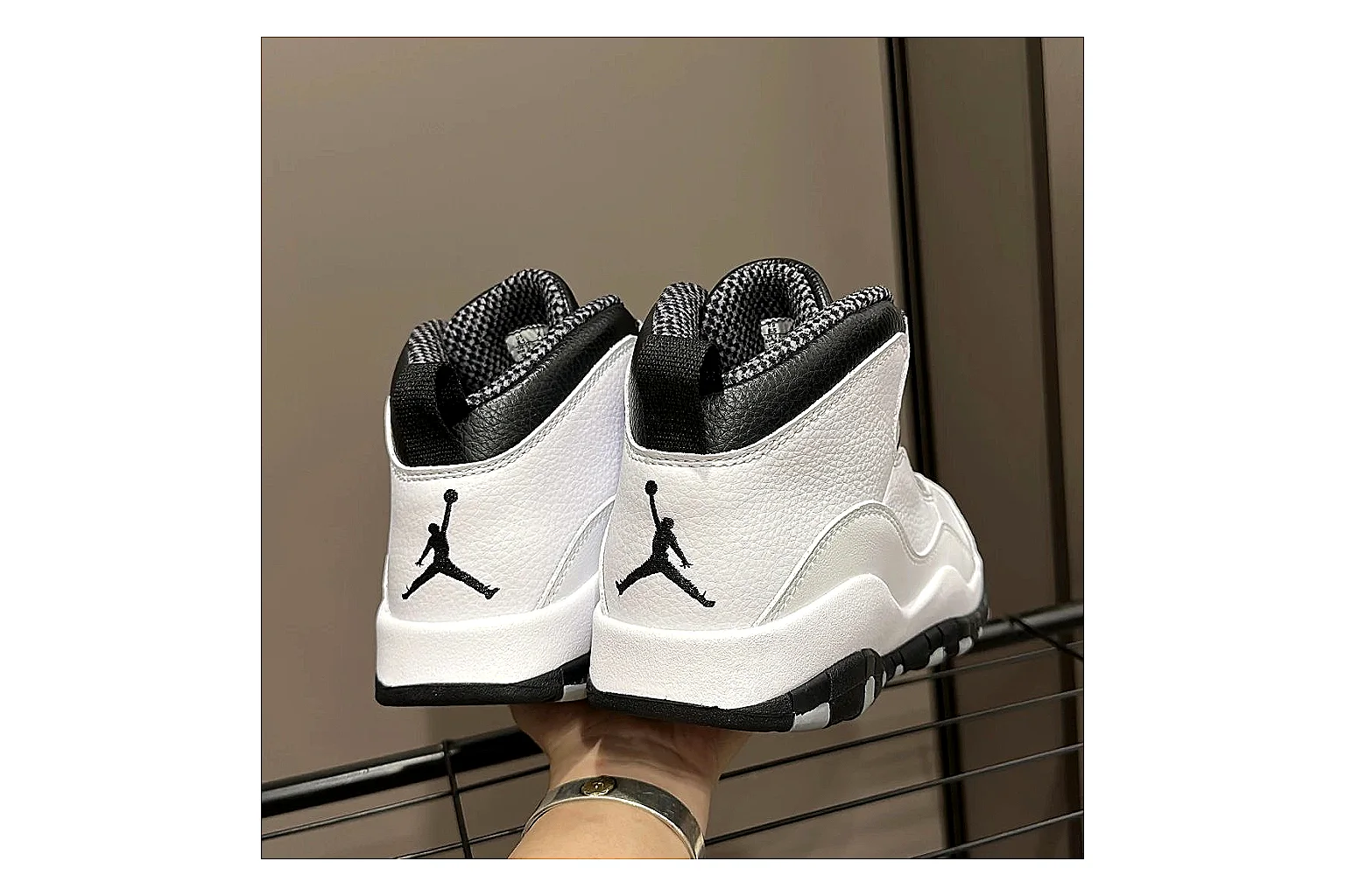 Jordan Air Jordan 10 Steel White Black spreadsheet record photo showing white and black high-top court upper, striped lace panels, Jumpman heel branding, and retro sole thumbnail 4