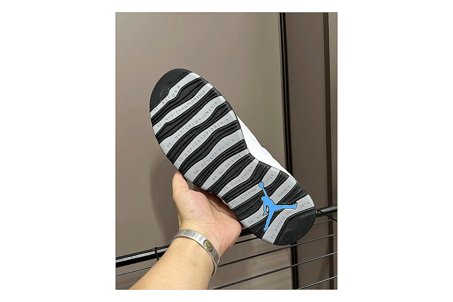 Jordan Air Jordan 10 Steel White Black spreadsheet record photo showing white and black high-top court upper, striped lace panels, Jumpman heel branding, and retro sole thumbnail 5