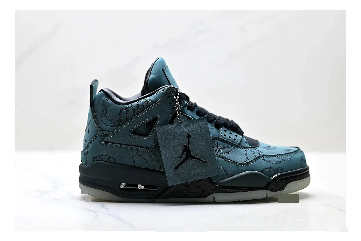 Jordan Air Jordan 4 Teal Black Sneakers spreadsheet record image with teal black retro basketball sneakers with nubuck texture, side-profile shape, upper panel lines, and outsole detail