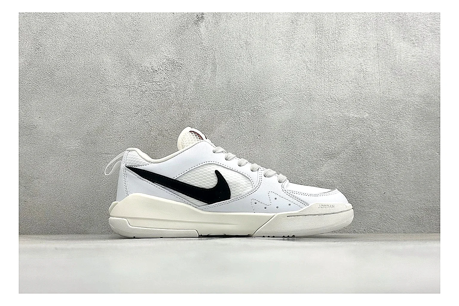 Jordan CMFT White Black spreadsheet record photo showing white and black layered court panels, red logo detail, low collar, and a clean contrast sole thumbnail 6