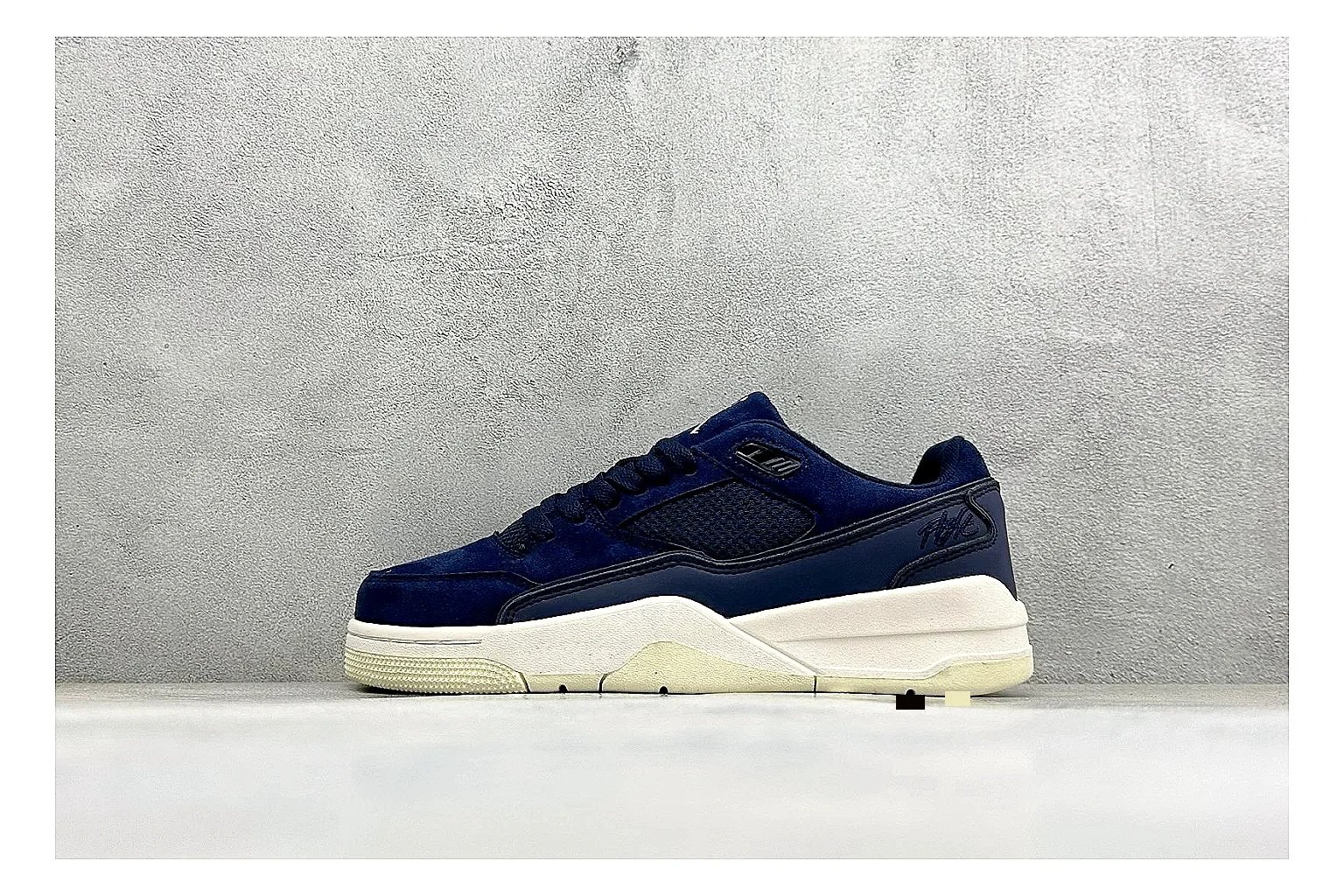 Jordan Flight Navy Suede spreadsheet record photo showing navy suede upper, low court silhouette, cream sole, and soft retro basketball profile