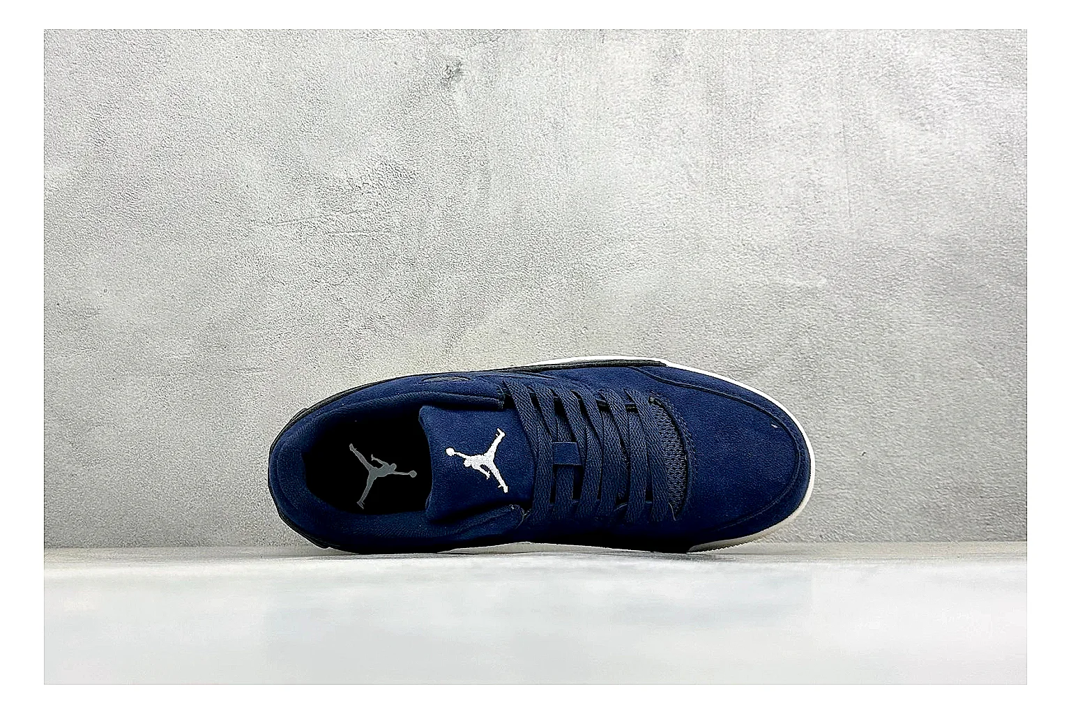 Jordan Flight Navy Suede spreadsheet record photo showing navy suede upper, low court silhouette, cream sole, and soft retro basketball profile thumbnail 2