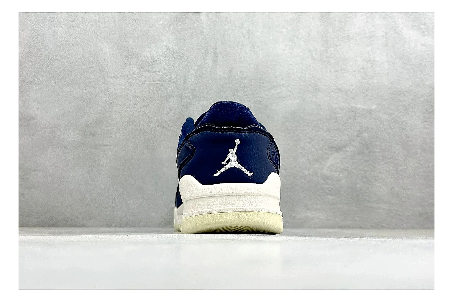 Jordan Flight Navy Suede spreadsheet record photo showing navy suede upper, low court silhouette, cream sole, and soft retro basketball profile thumbnail 3