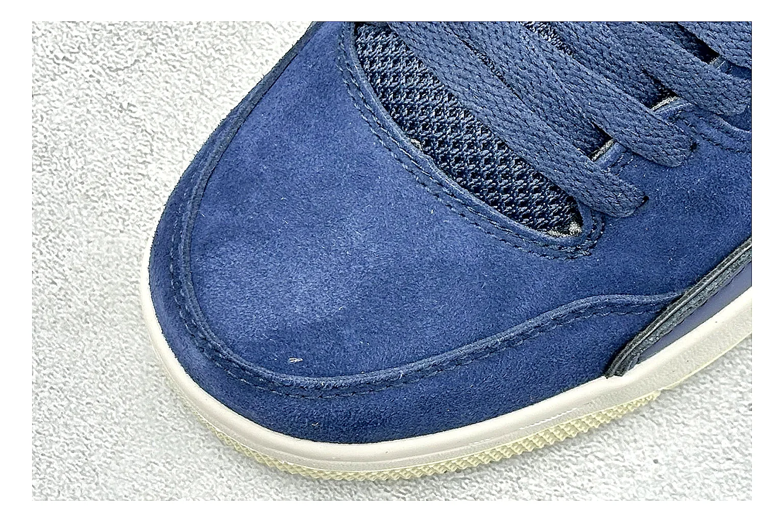 Jordan Flight Navy Suede spreadsheet record photo showing navy suede upper, low court silhouette, cream sole, and soft retro basketball profile thumbnail 5