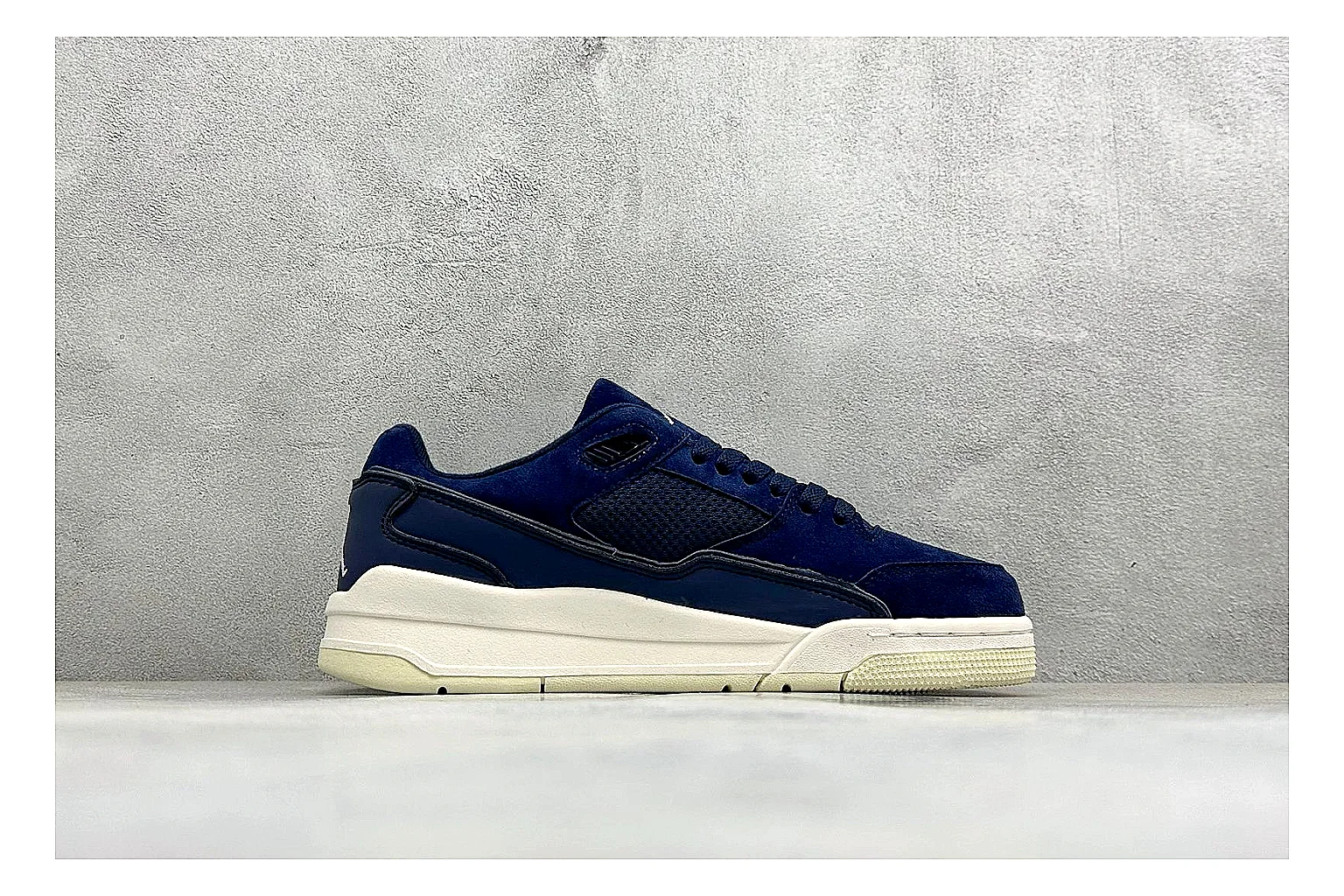 Jordan Flight Navy Suede spreadsheet record photo showing navy suede upper, low court silhouette, cream sole, and soft retro basketball profile thumbnail 6