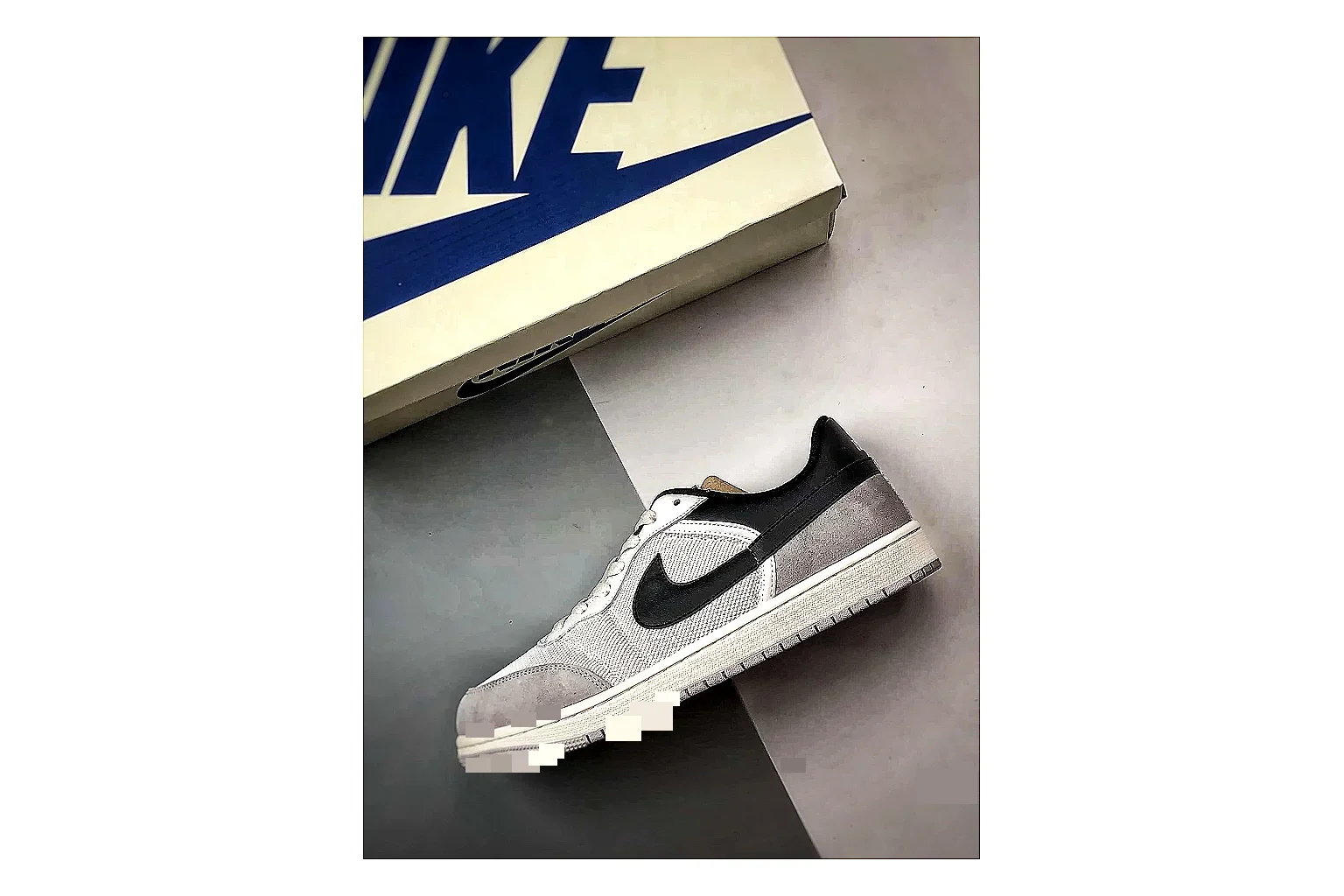 Jordan Low Black White Sneaker Sheetbase record image with white black low-top sneaker with mixed-material upper and low-profile shape