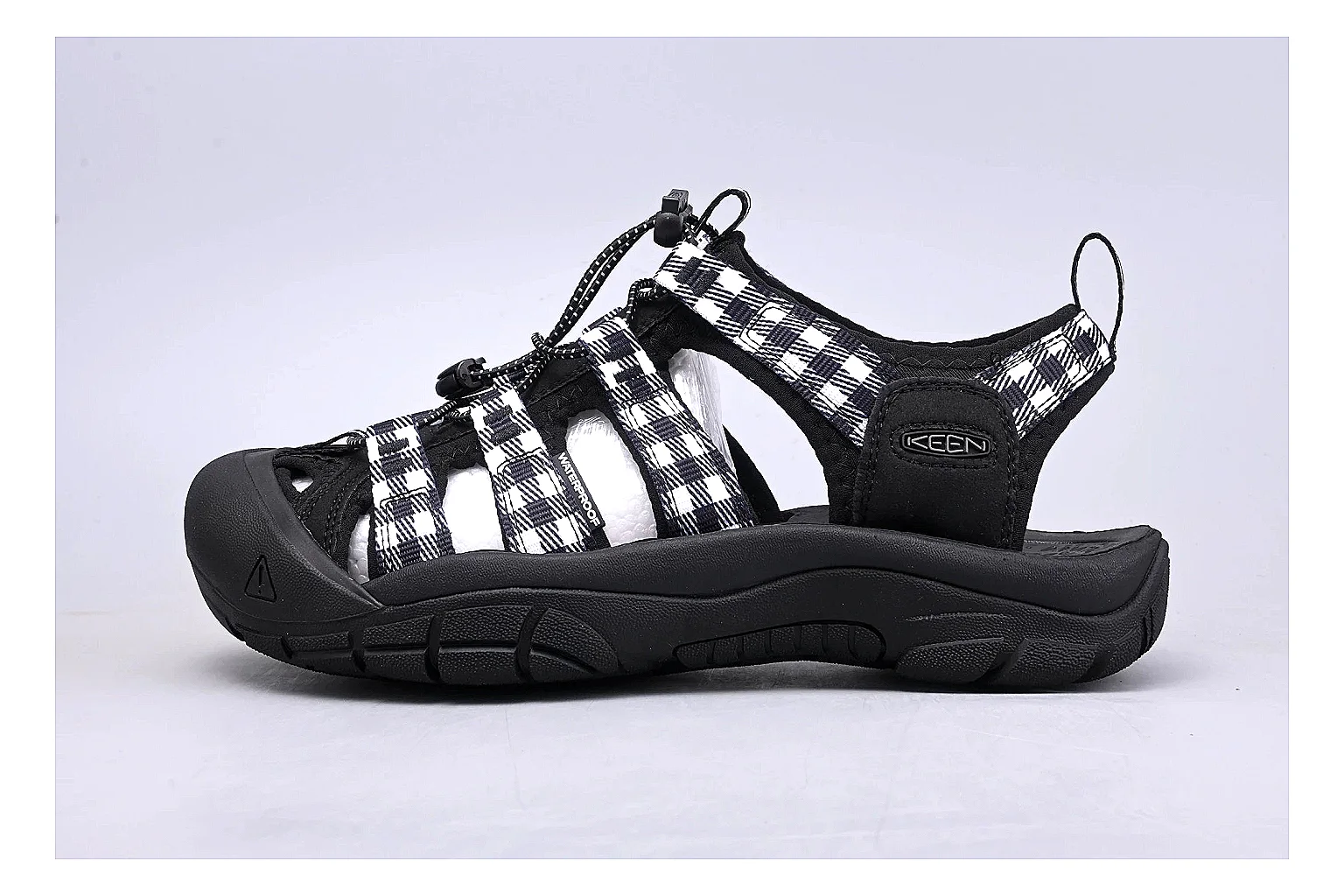 KEEN Zerraport Plaid Sandal Sheetbase record image with white black plaid zerraport outdoor sandal with mixed upper and sandal shape
