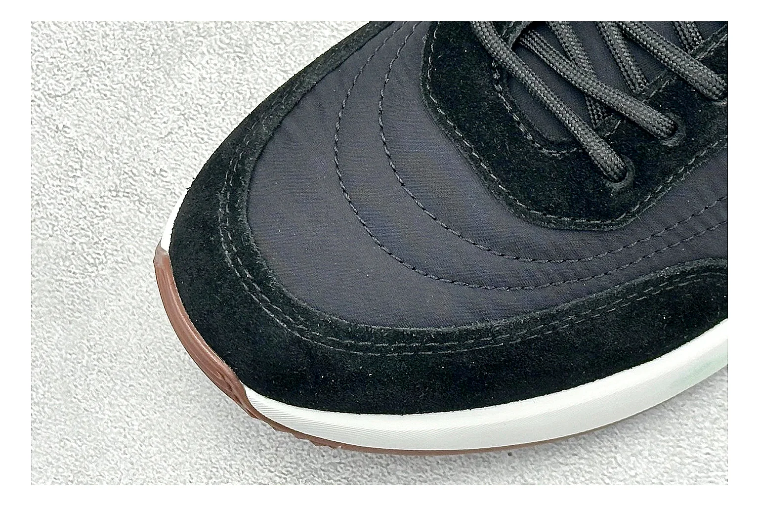 Loro Piana Week-End Black spreadsheet record image showing black suede upper, low casual profile, striped midsole accent, and soft everyday shape thumbnail 5