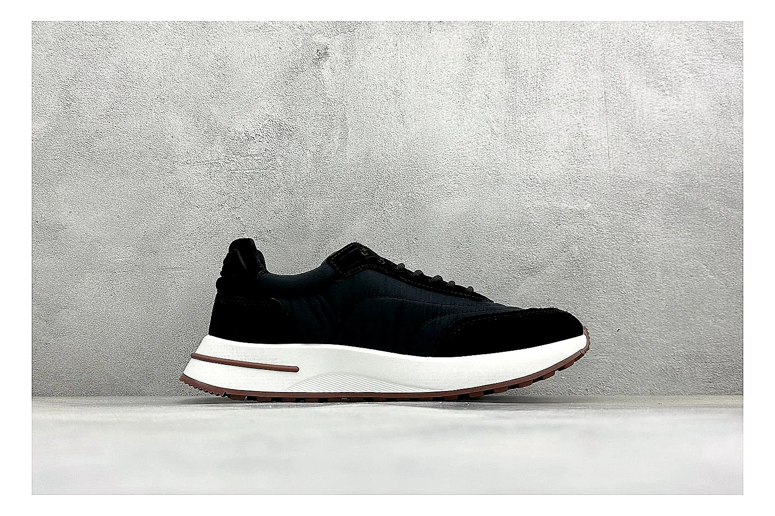 Loro Piana Week-End Black spreadsheet record image showing black suede upper, low casual profile, striped midsole accent, and soft everyday shape thumbnail 6