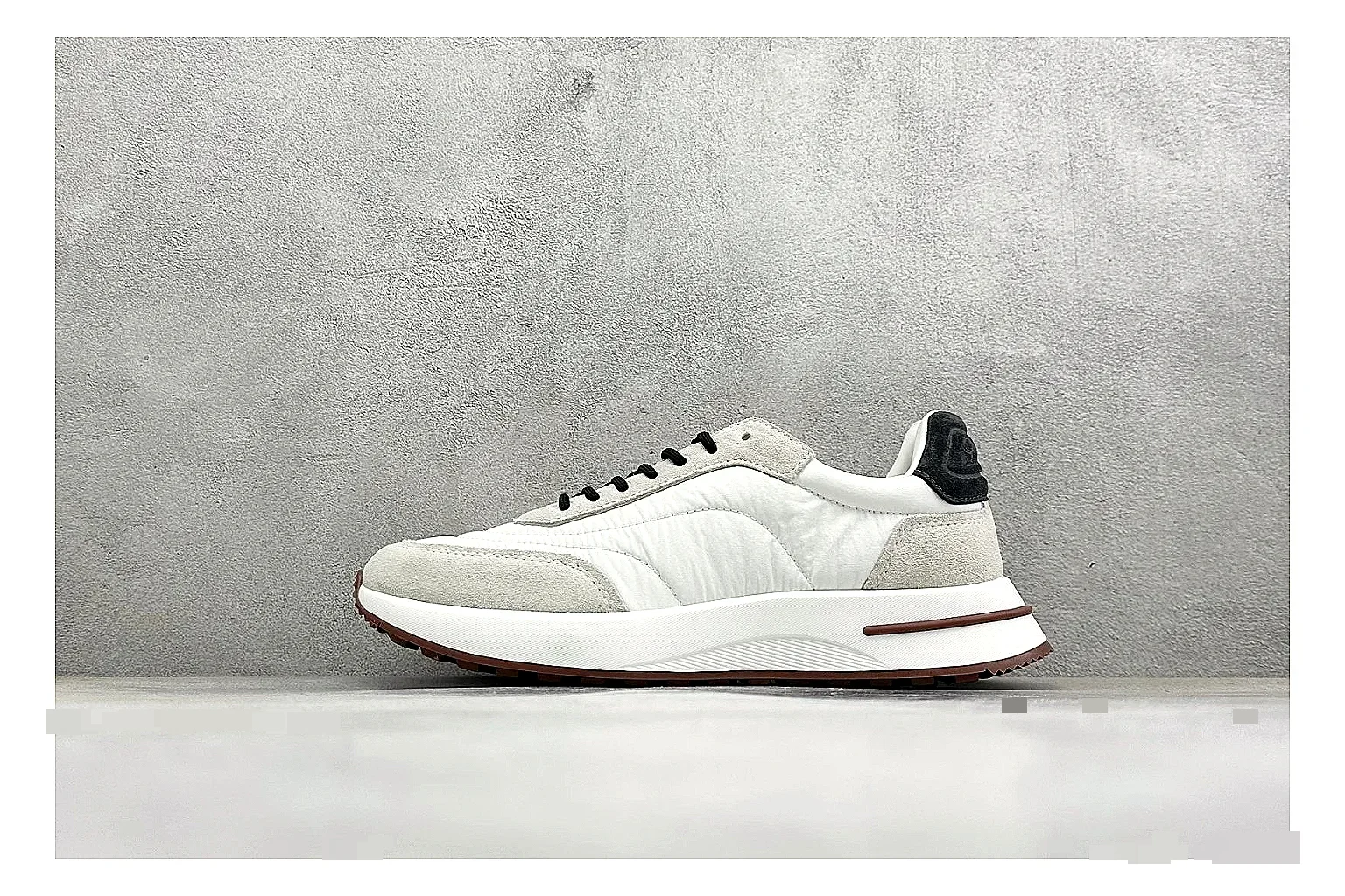 Loro Piana Week-End White spreadsheet record image showing white leather upper, gum outsole, low clean profile, and restrained casual detailing