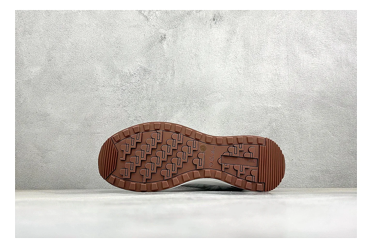 Loro Piana Week-End White spreadsheet record image showing white leather upper, gum outsole, low clean profile, and restrained casual detailing