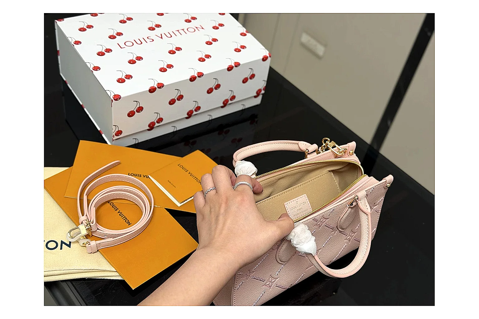 Louis Vuitton Mini Top Handle Pink spreadsheet record photo showing pink leather mini bag body, structured top handle, compact luxury shape, and clean hardware details