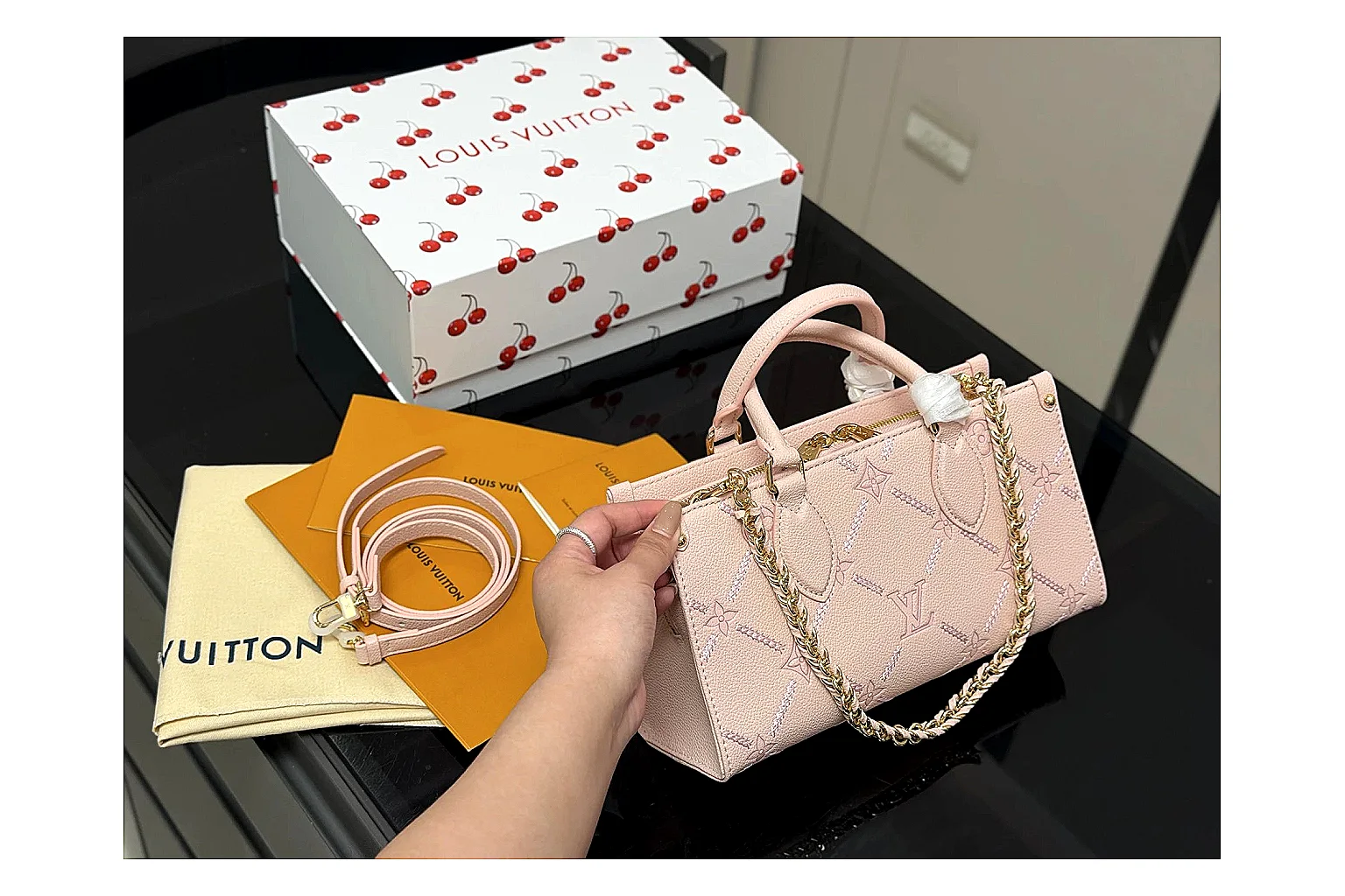 Louis Vuitton Mini Top Handle Pink spreadsheet record photo showing pink leather mini bag body, structured top handle, compact luxury shape, and clean hardware details thumbnail 6