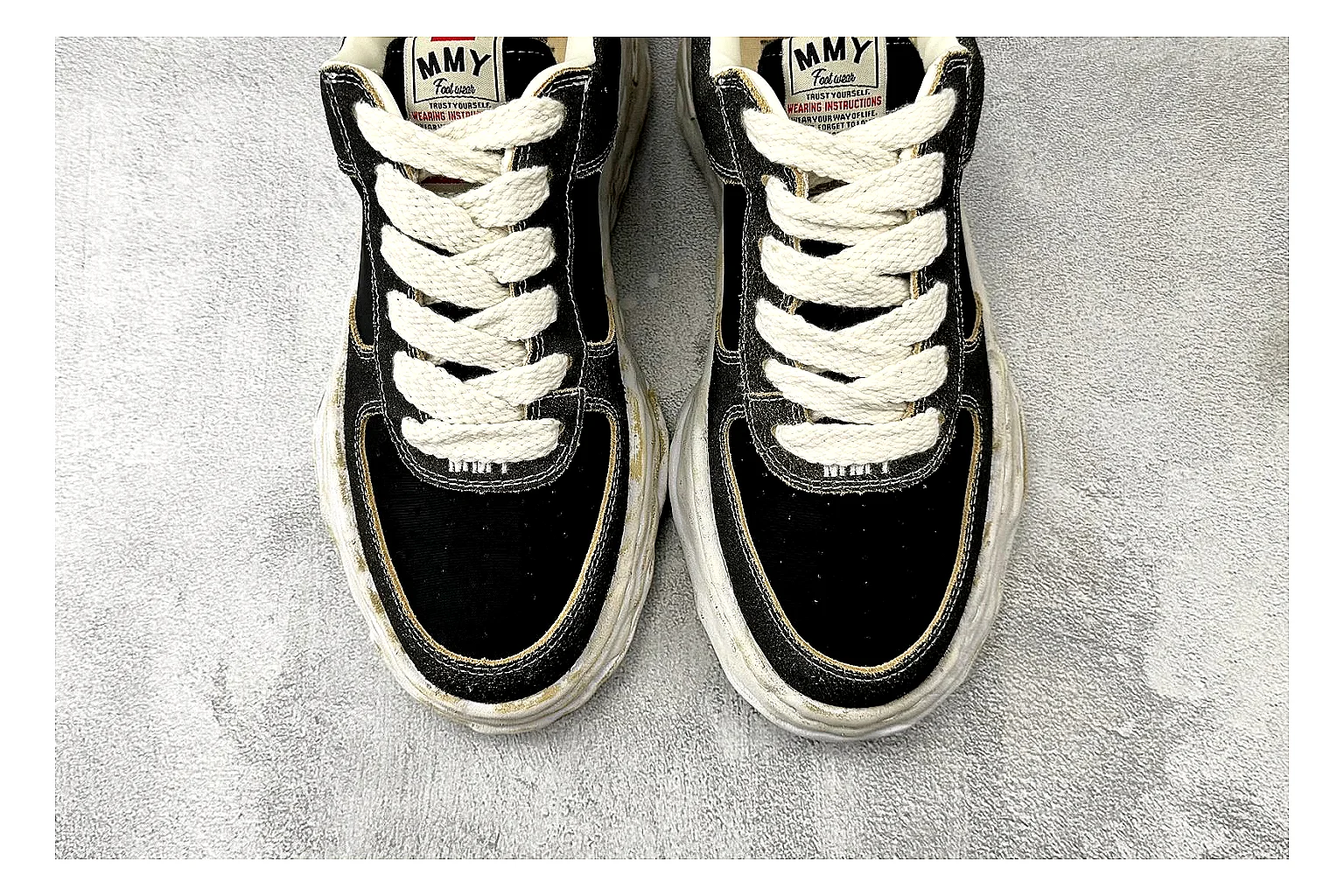 Maison Mihara Yasuhiro Blakey Black Distressed spreadsheet record photo showing black distressed canvas upper, warped sculpted white sole, low lace profile, and worn texture thumbnail 5