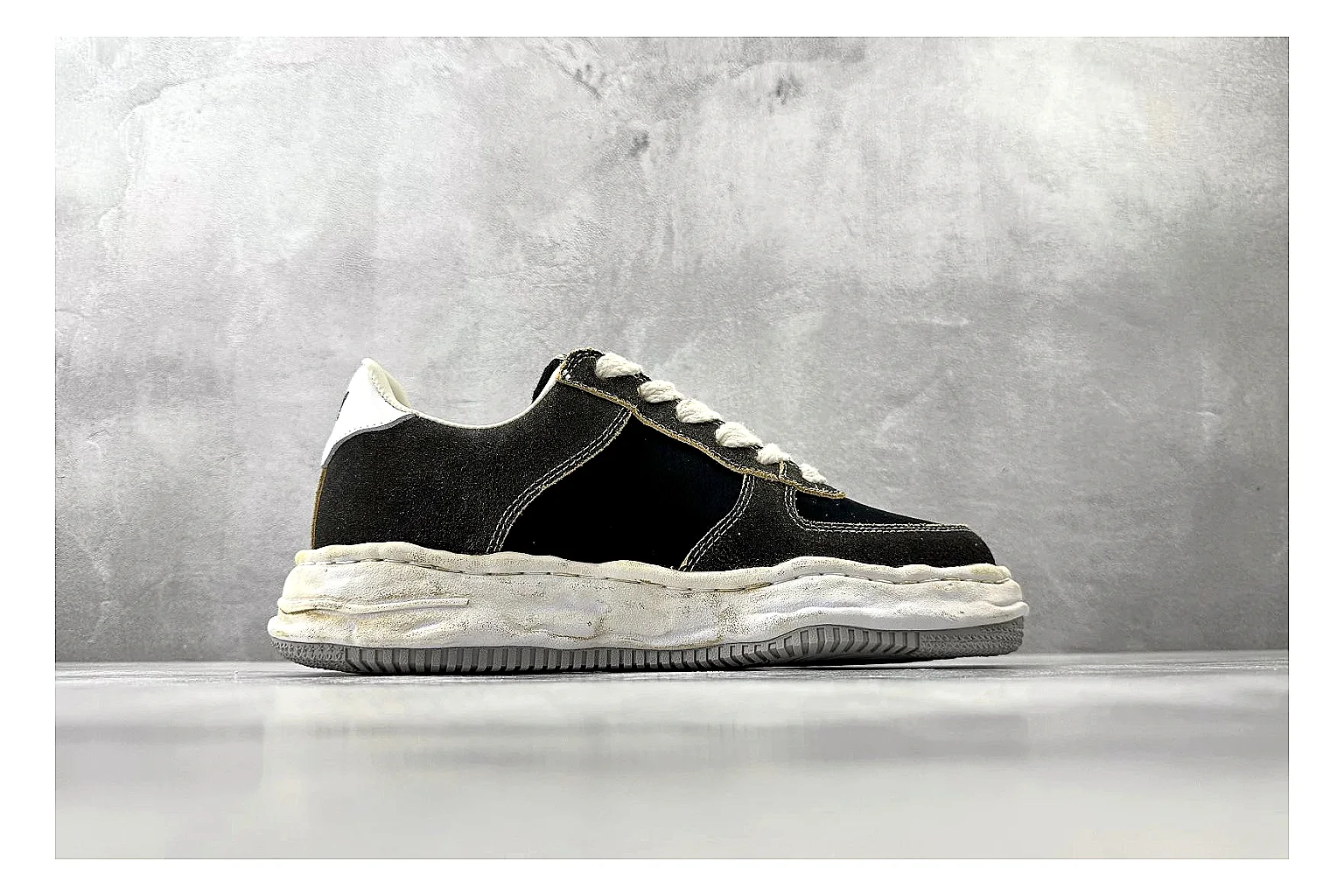Maison Mihara Yasuhiro Blakey Black Distressed spreadsheet record photo showing black distressed canvas upper, warped sculpted white sole, low lace profile, and worn texture thumbnail 6
