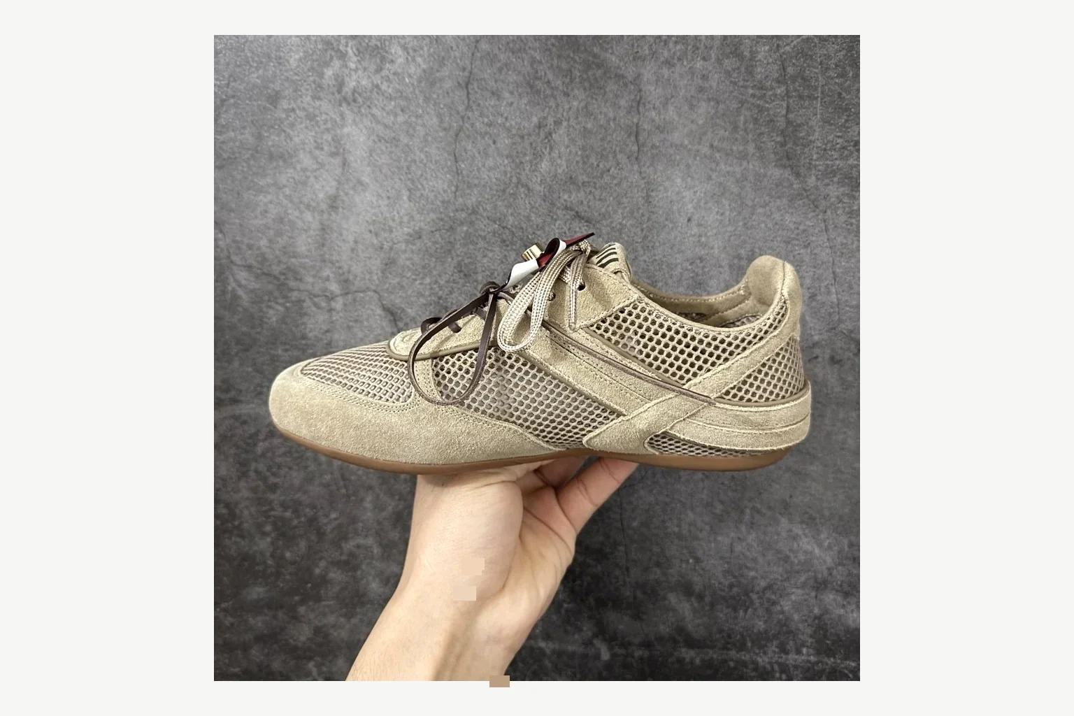 Miu Miu Beige Logo Sneaker Sheetbase record image with beige logo low-top with mixed-material upper and low-profile shape