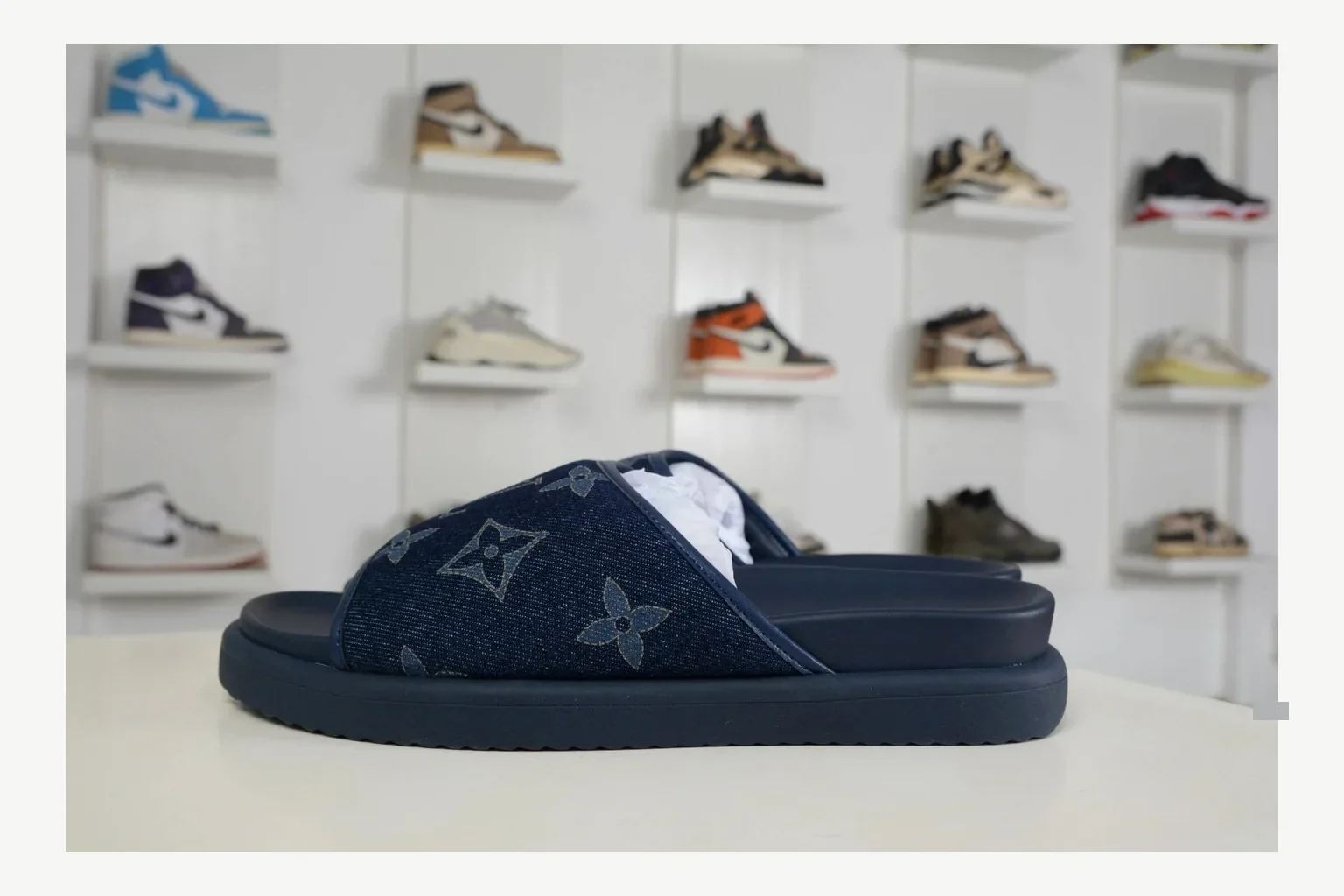 Miu Miu Navy Denim Slide Sheetbase record image with navy denim denim slide with denim upper and low-profile shape