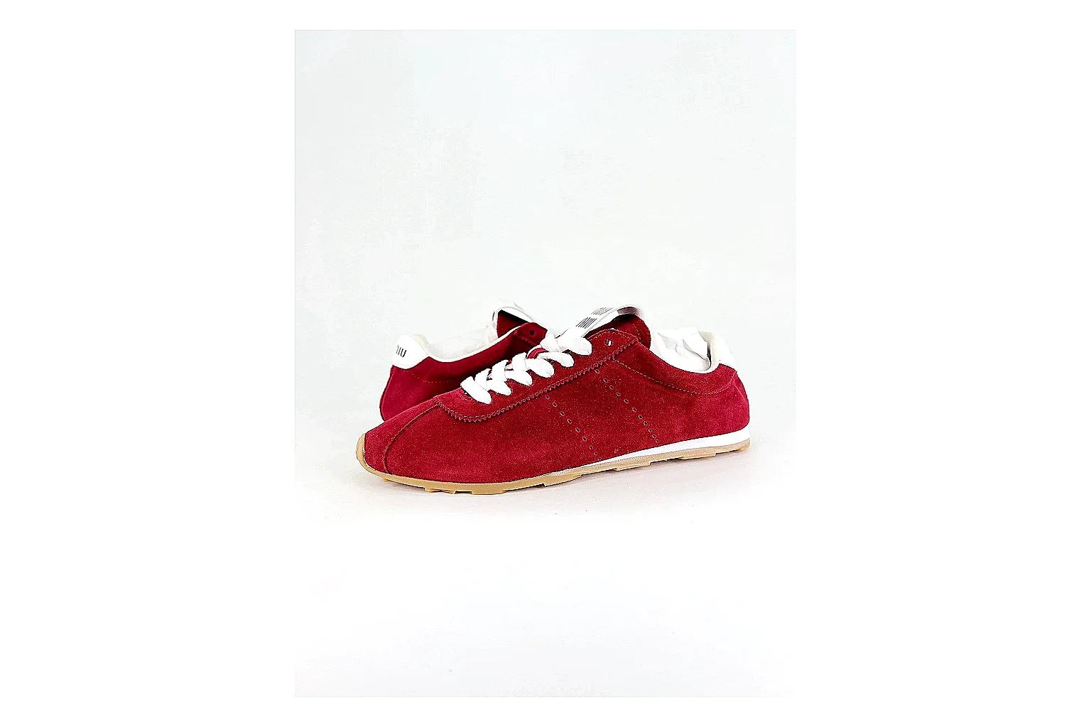 Miu Miu Red Suede Sneaker Sheetbase record image with red fashion low-top with mixed-material upper and low-profile shape
