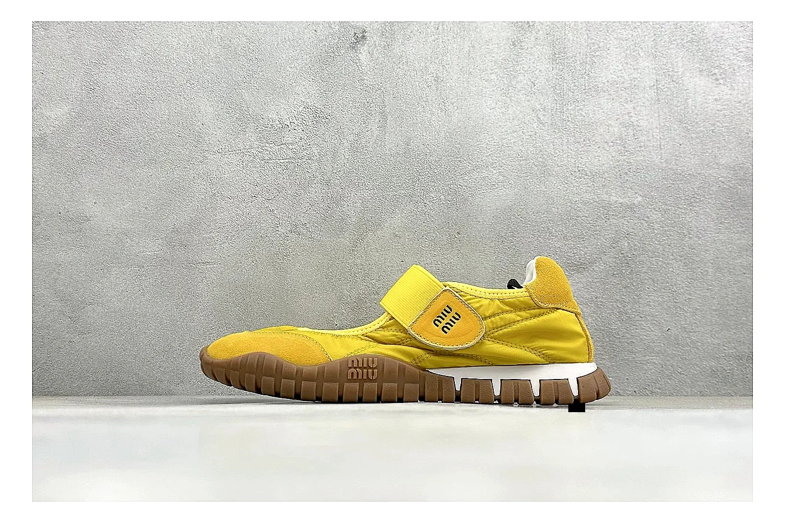 Miu Miu Tyre Yellow Mary Jane spreadsheet record photo showing yellow Mary Jane upper, strap closure, rugged Tyre outsole, and playful low-profile shape