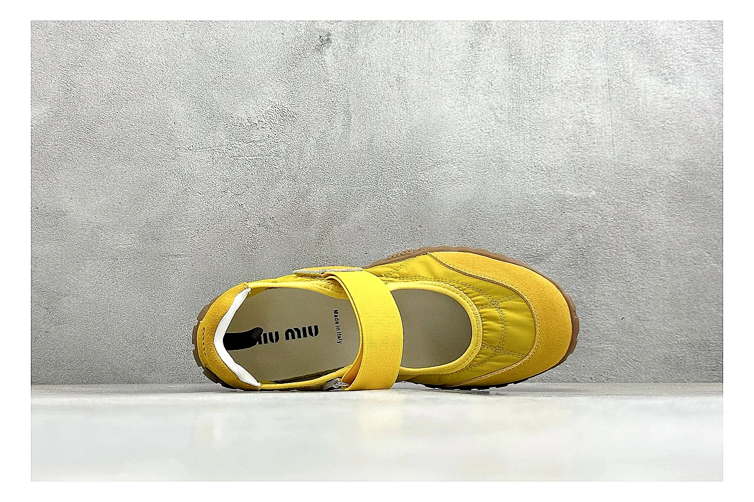 Miu Miu Tyre Yellow Mary Jane spreadsheet record photo showing yellow Mary Jane upper, strap closure, rugged Tyre outsole, and playful low-profile shape thumbnail 2