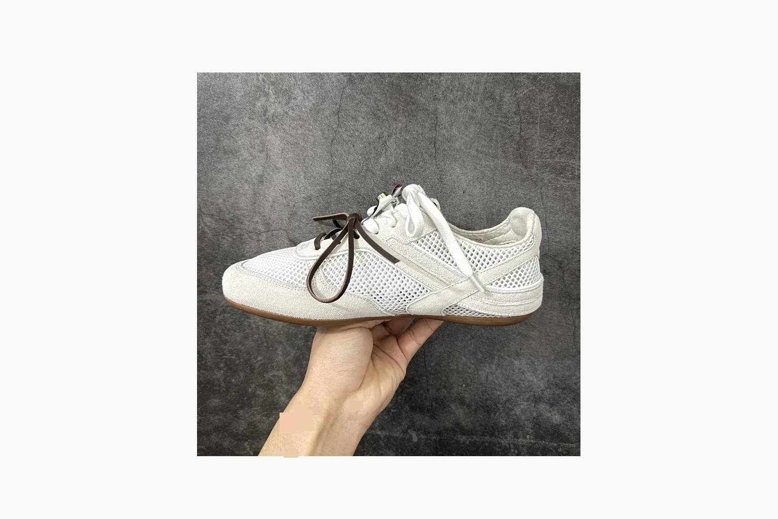 Miu Miu White Bow Sneaker Sheetbase record image with white bow-detail low-top with mixed-material upper and low-profile shape